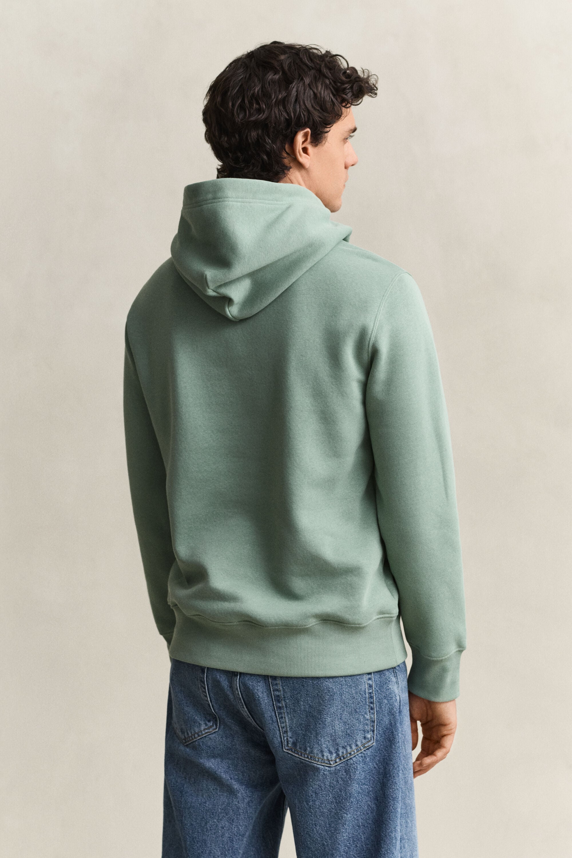 Sweat à capuche avec écusson