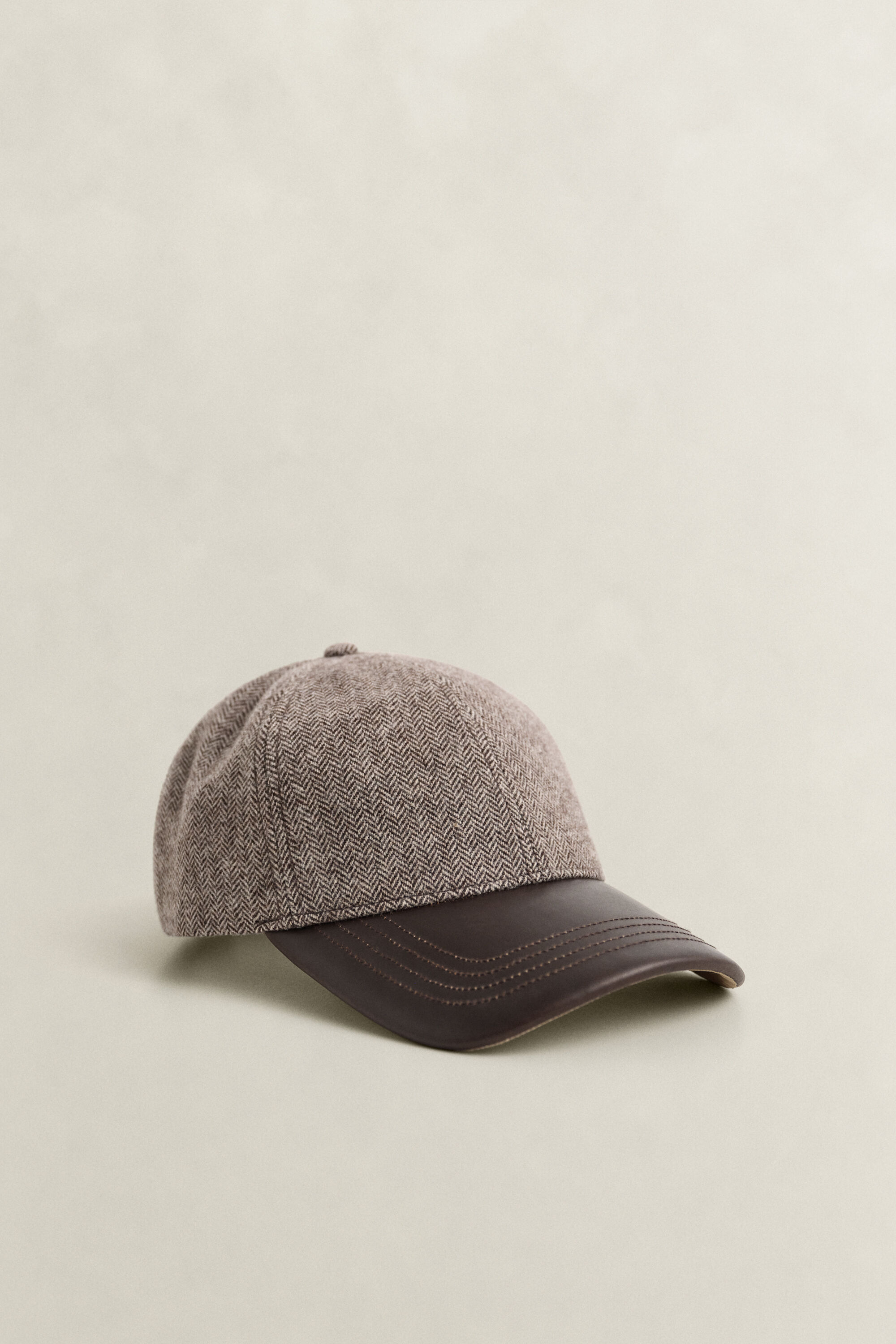 Casquette en laine mélangée avec visière en cuir