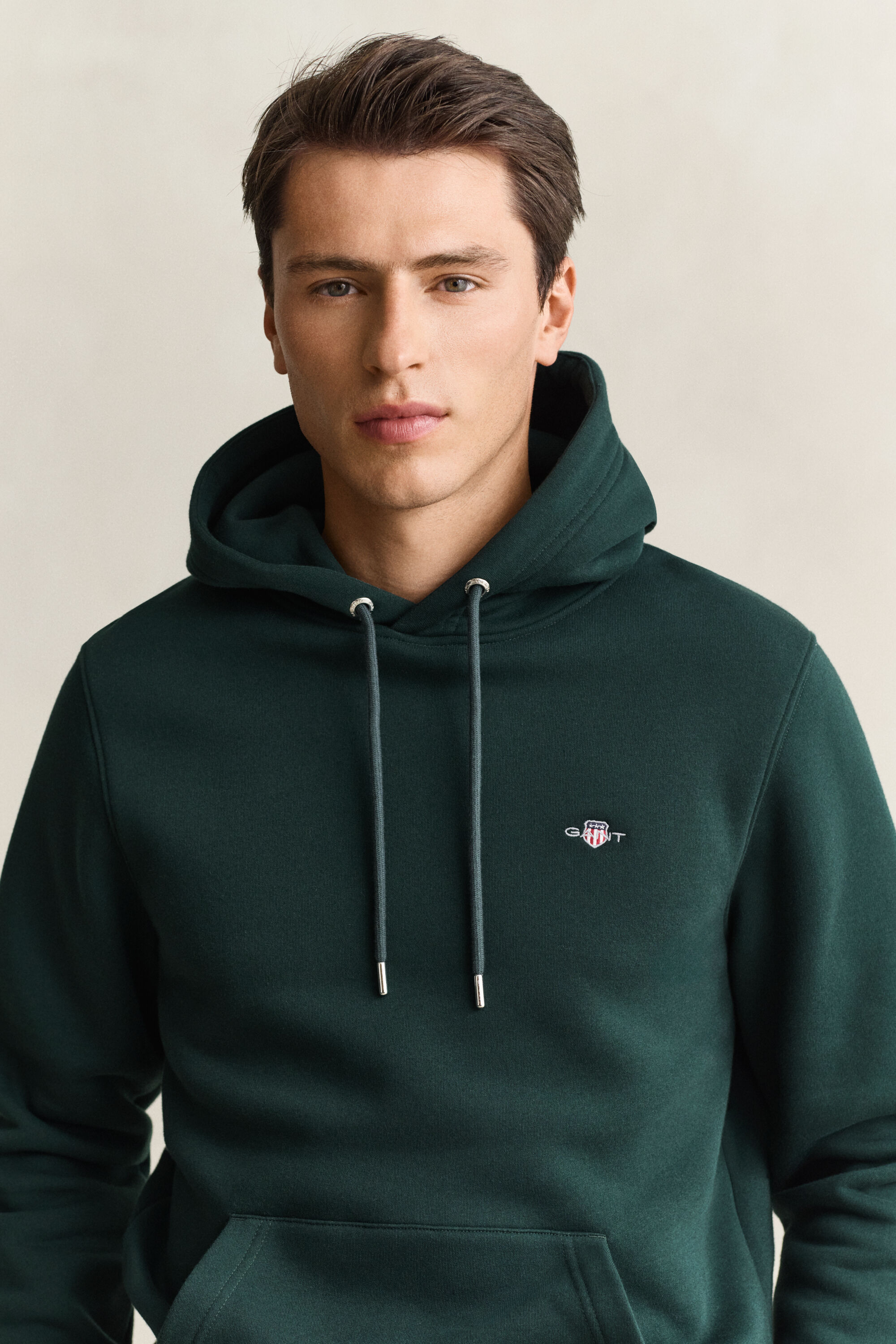 Sweat à capuche avec écusson