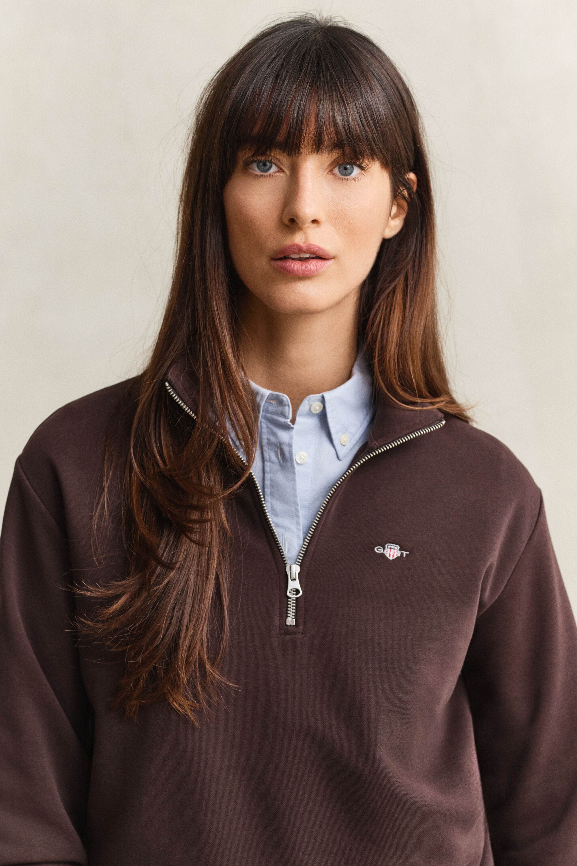 Sweat-shirt à demi-zip avec écusson