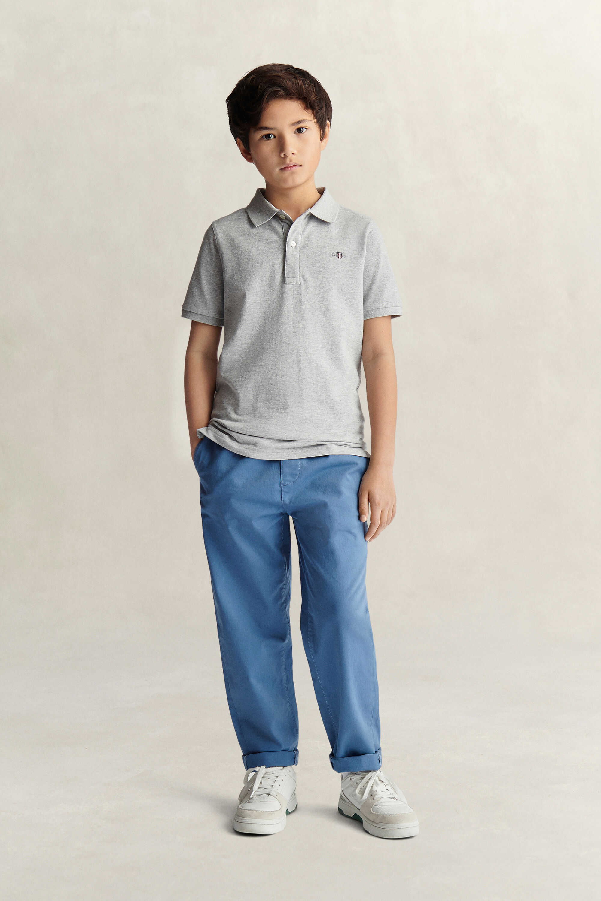 Poloshirt met schild voor tieners