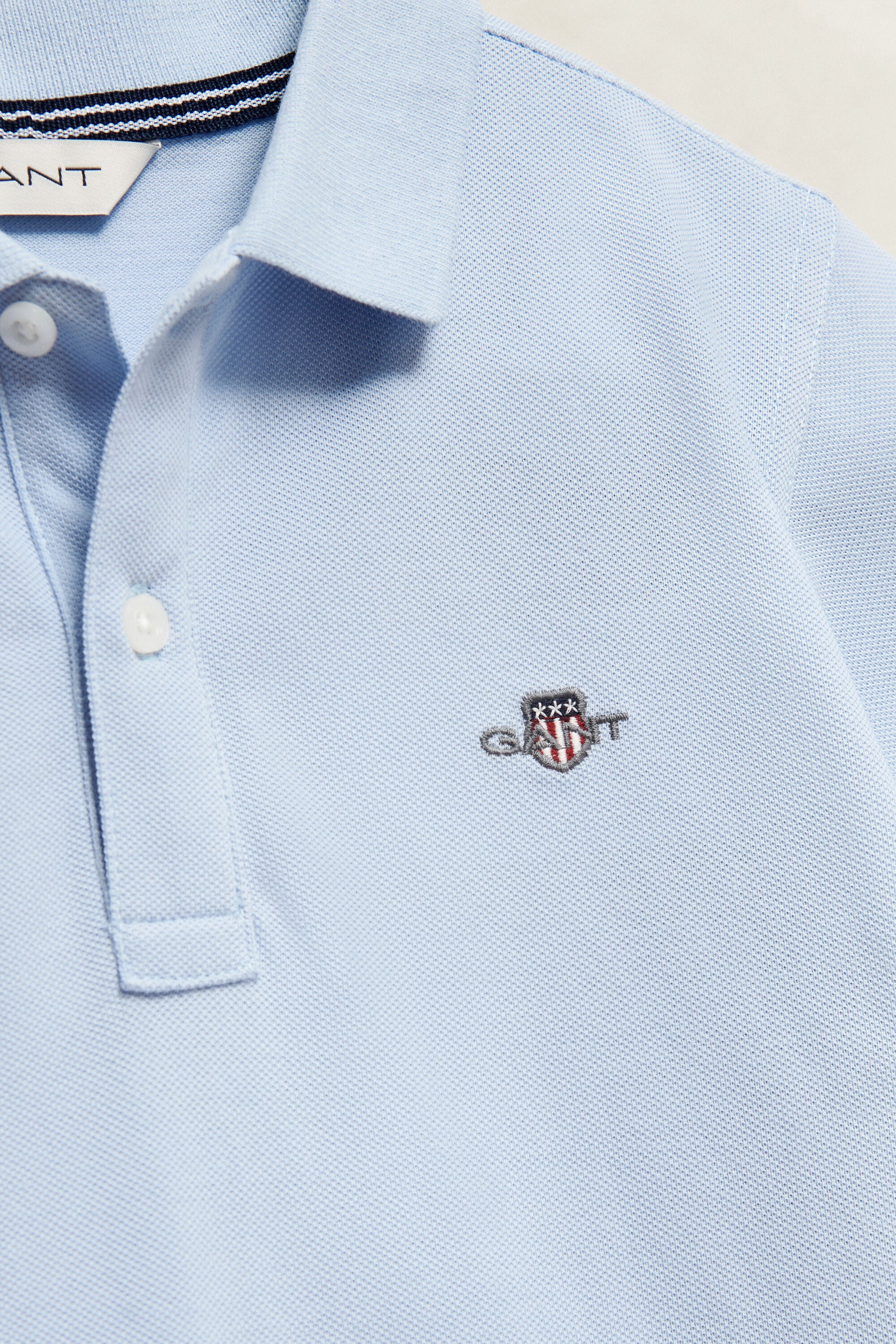 Polo avec écusson Ado