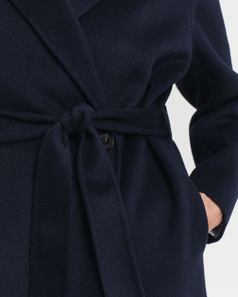 Manteau cousu main avec ceinture