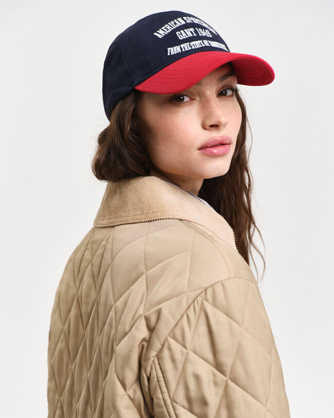 Manteau matelassé avec finitions en velours côtelé