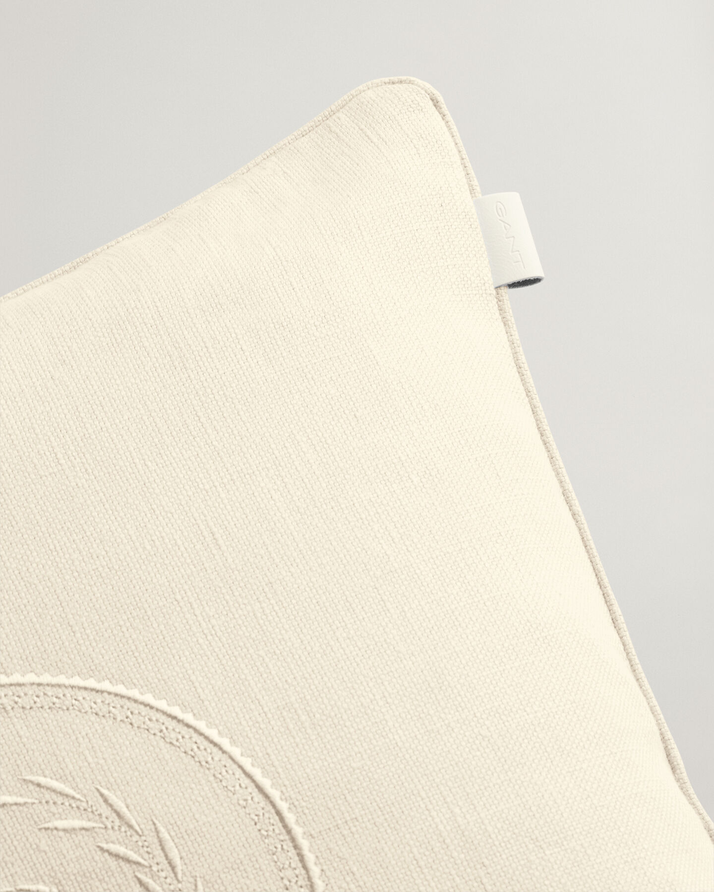 Housse de coussin Crest ton sur ton