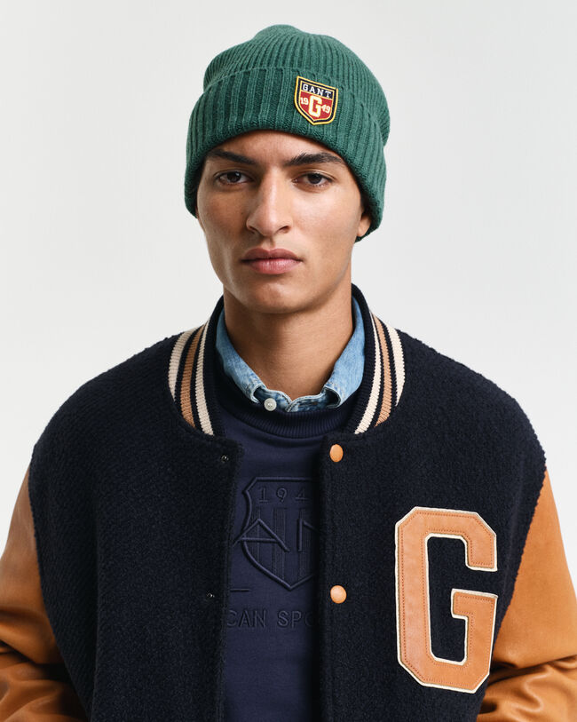 Wollen beanie met badge