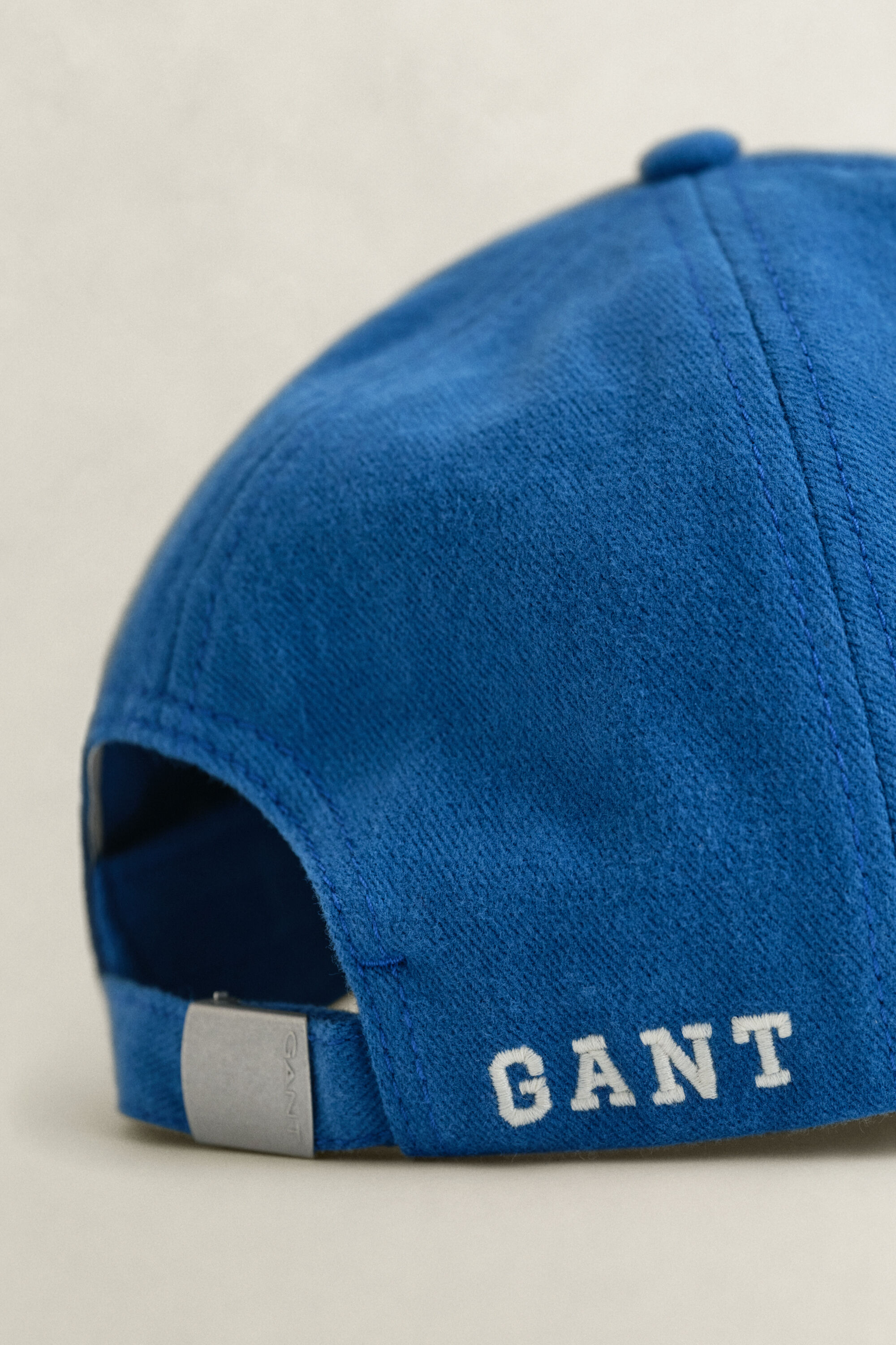 Moleskin pet met G-badge