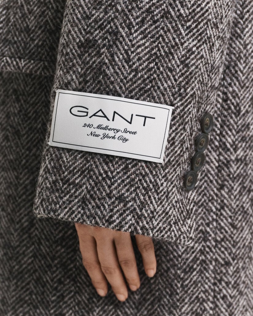 Overjas van wolmix met visgraatmotief