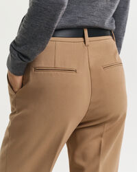 Pantalon habillé coupe slim évasé