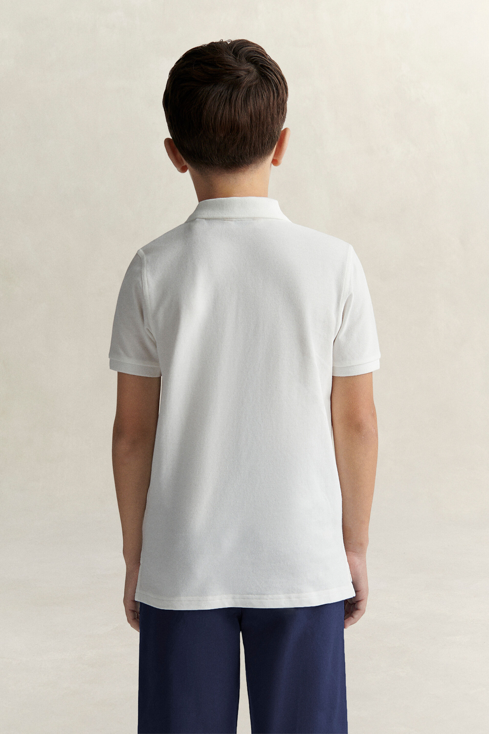 Poloshirt met schild voor tieners