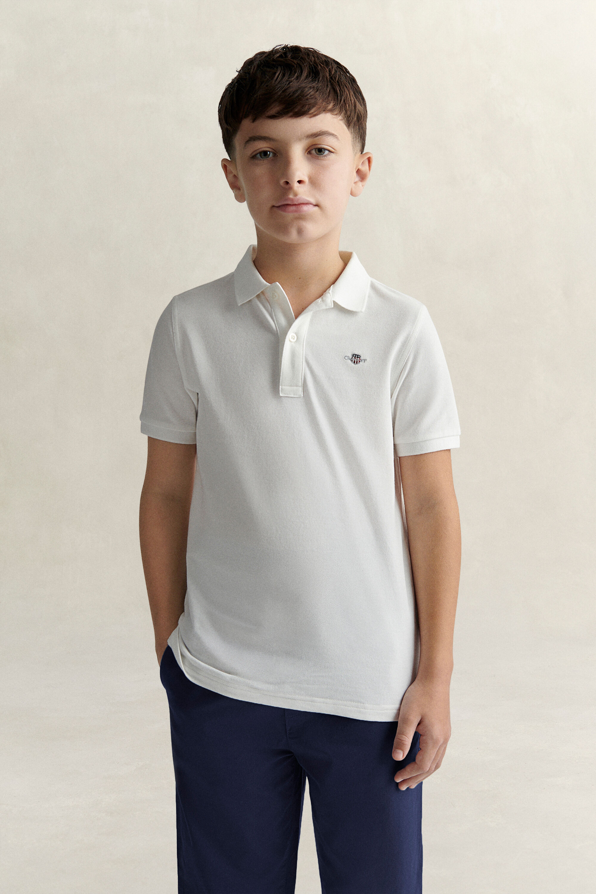 Poloshirt met schild voor tieners