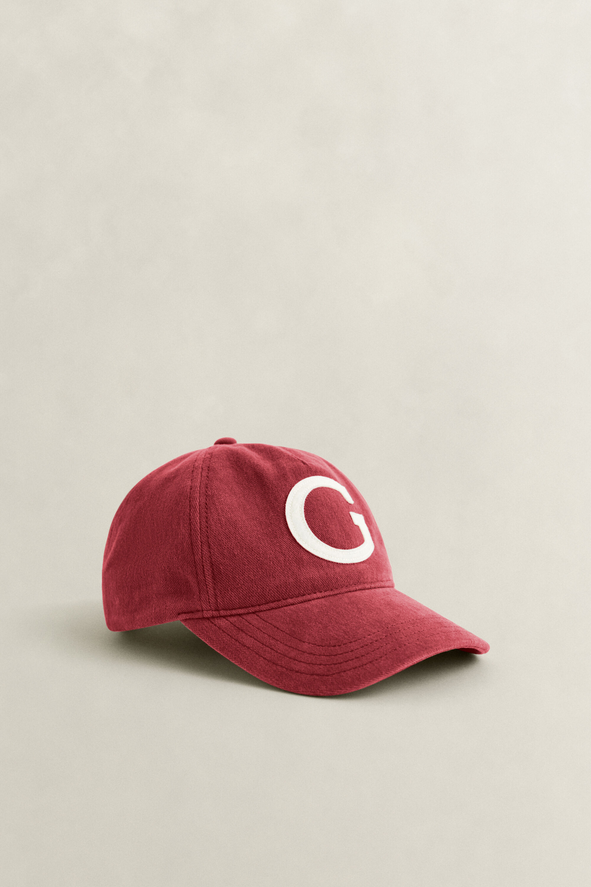 Moleskin pet met G-badge