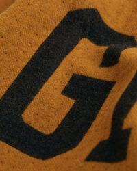 Poncho en laine Logo