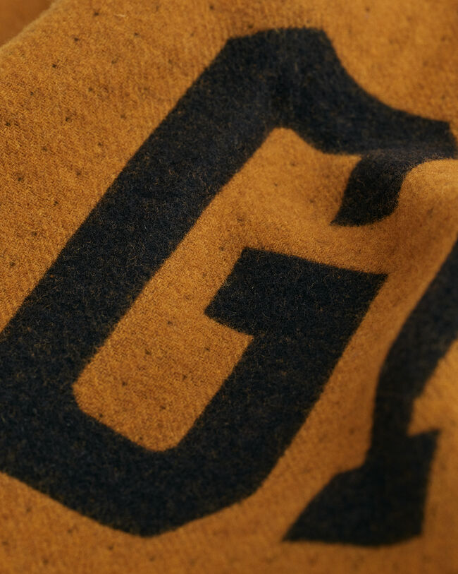 Poncho en laine Logo