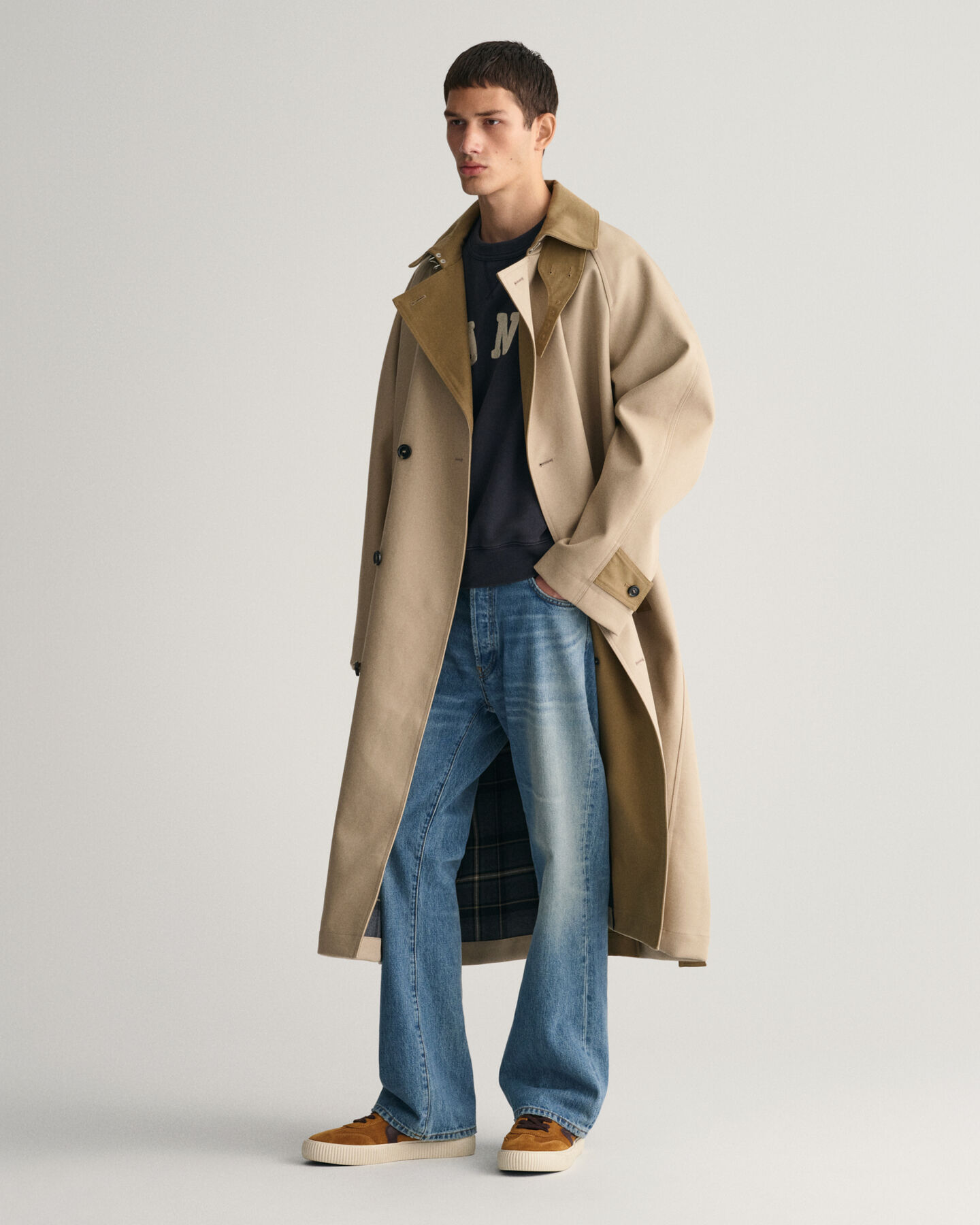 Trench-coat à coutures fixées