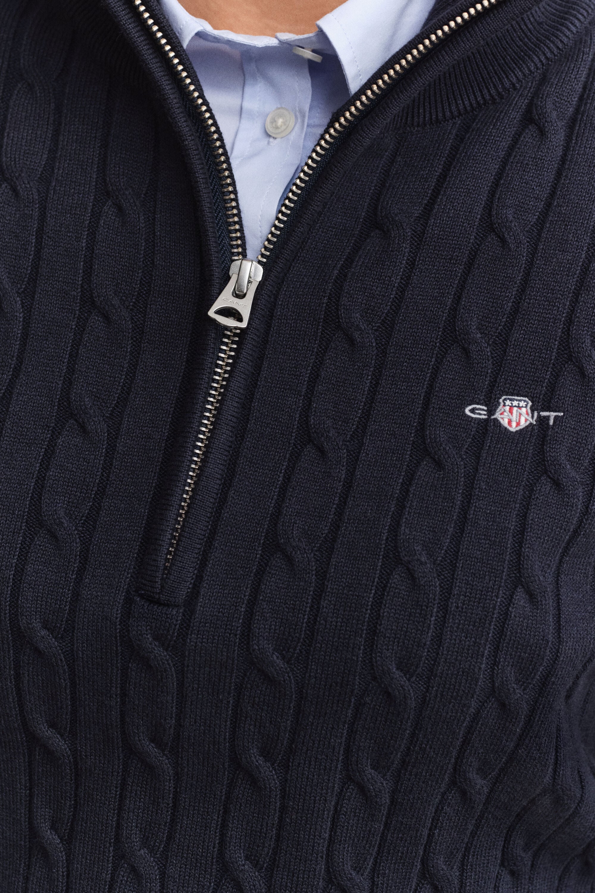 Pull à demi-zip en maille torsadée extensible