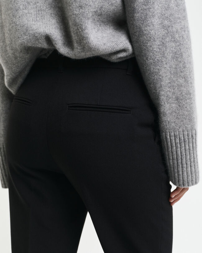 Pantalon habillé coupe slim évasé