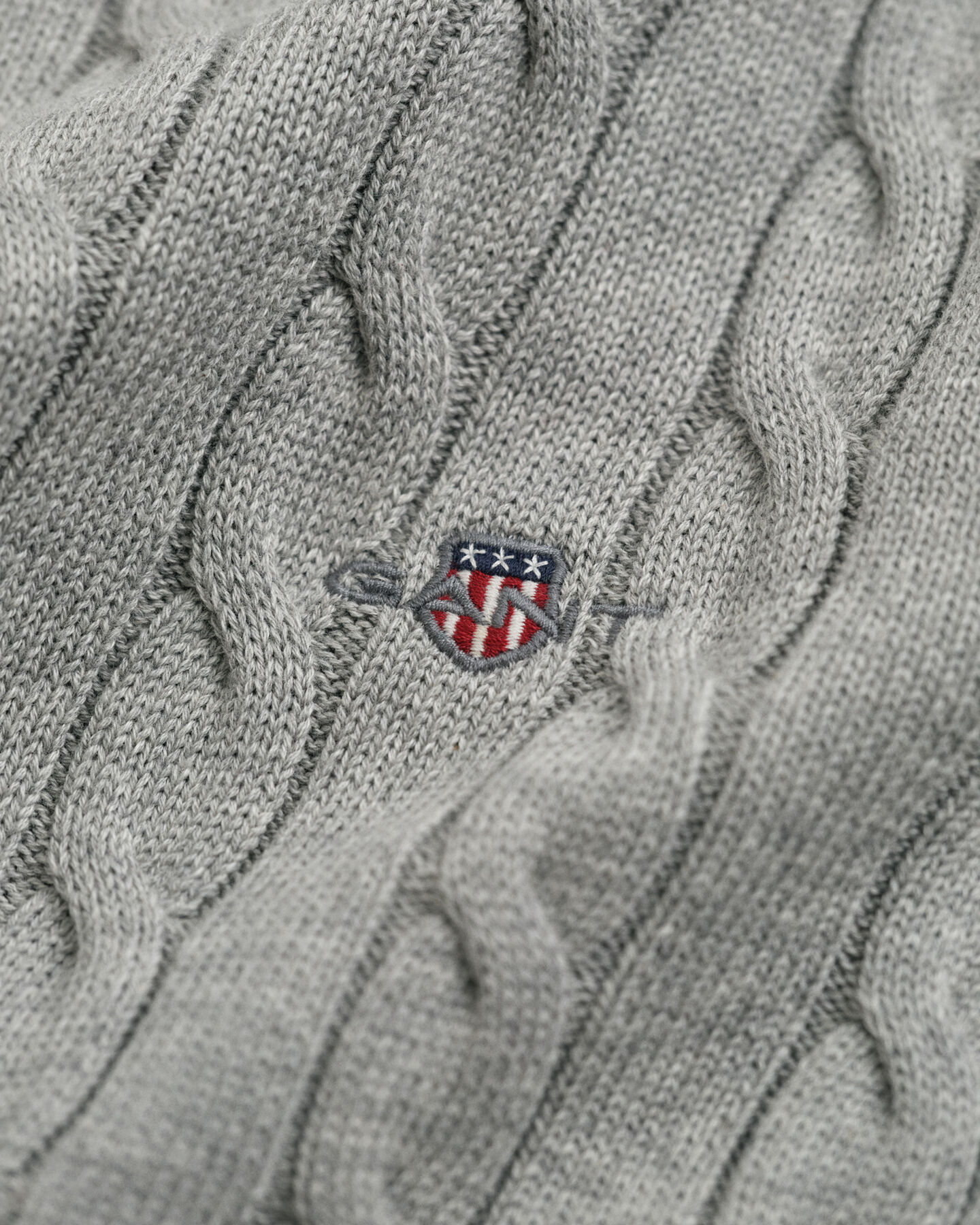 Pull col roulé en maille torsadée de coton