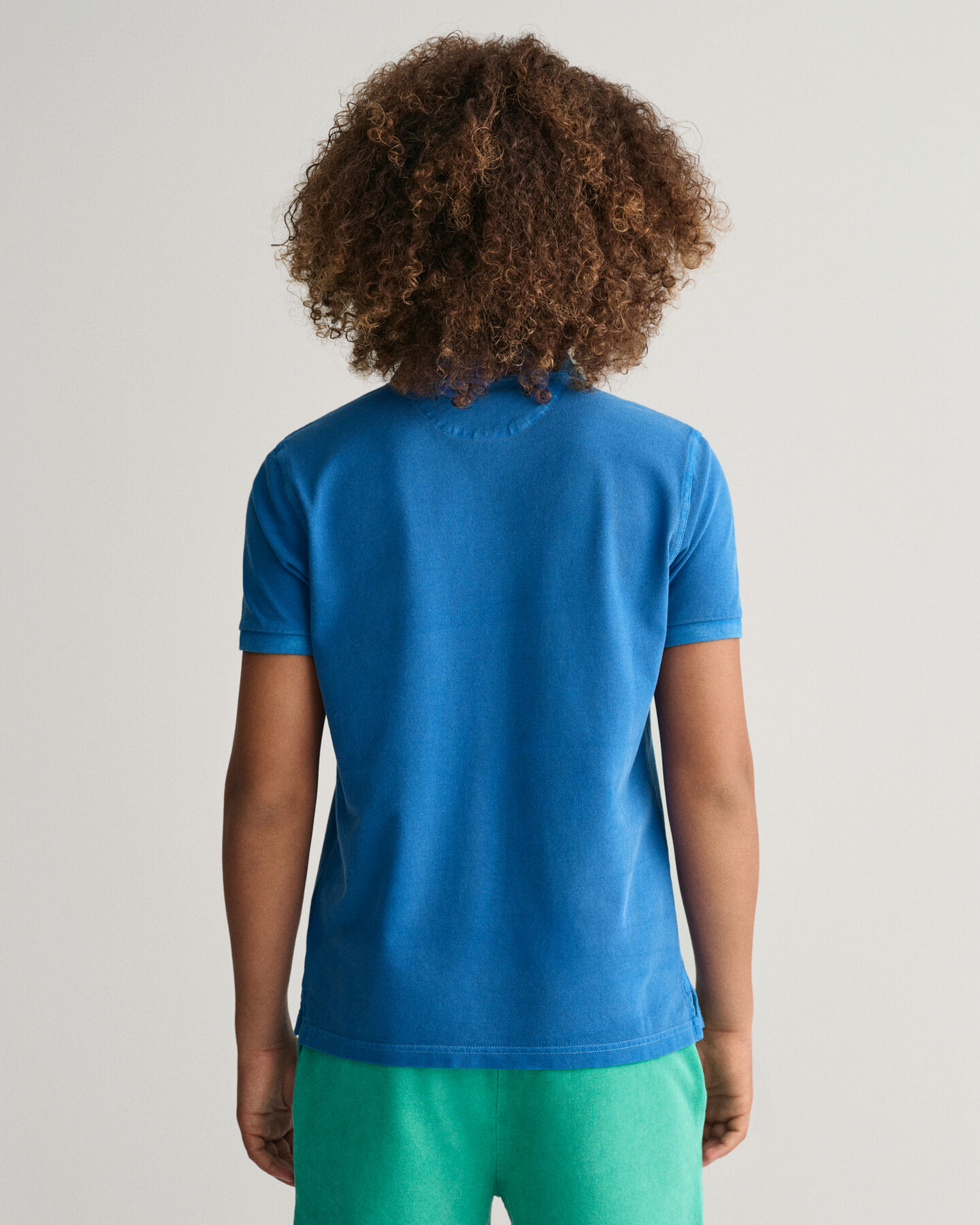 Teens Sunfaded piqu&eacute; poloshirt