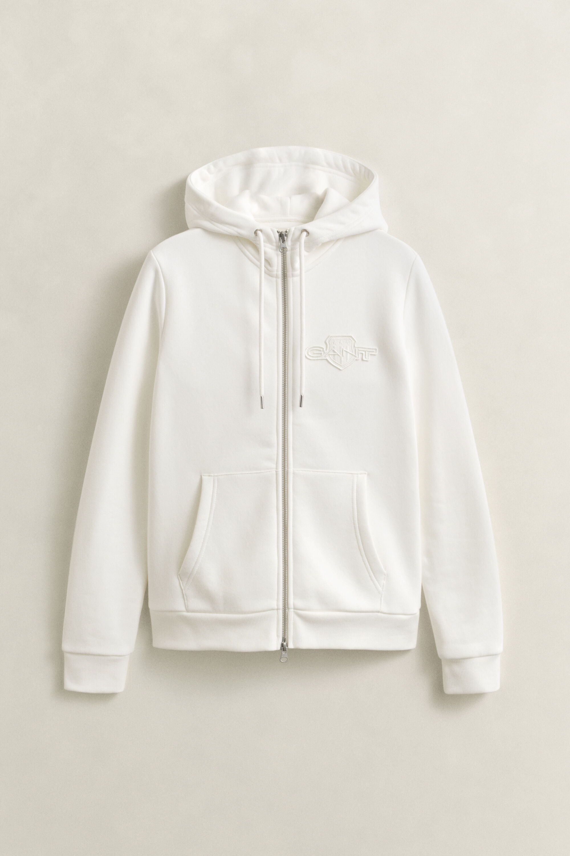 Sweat à capuche zippé avec écusson ton sur ton
