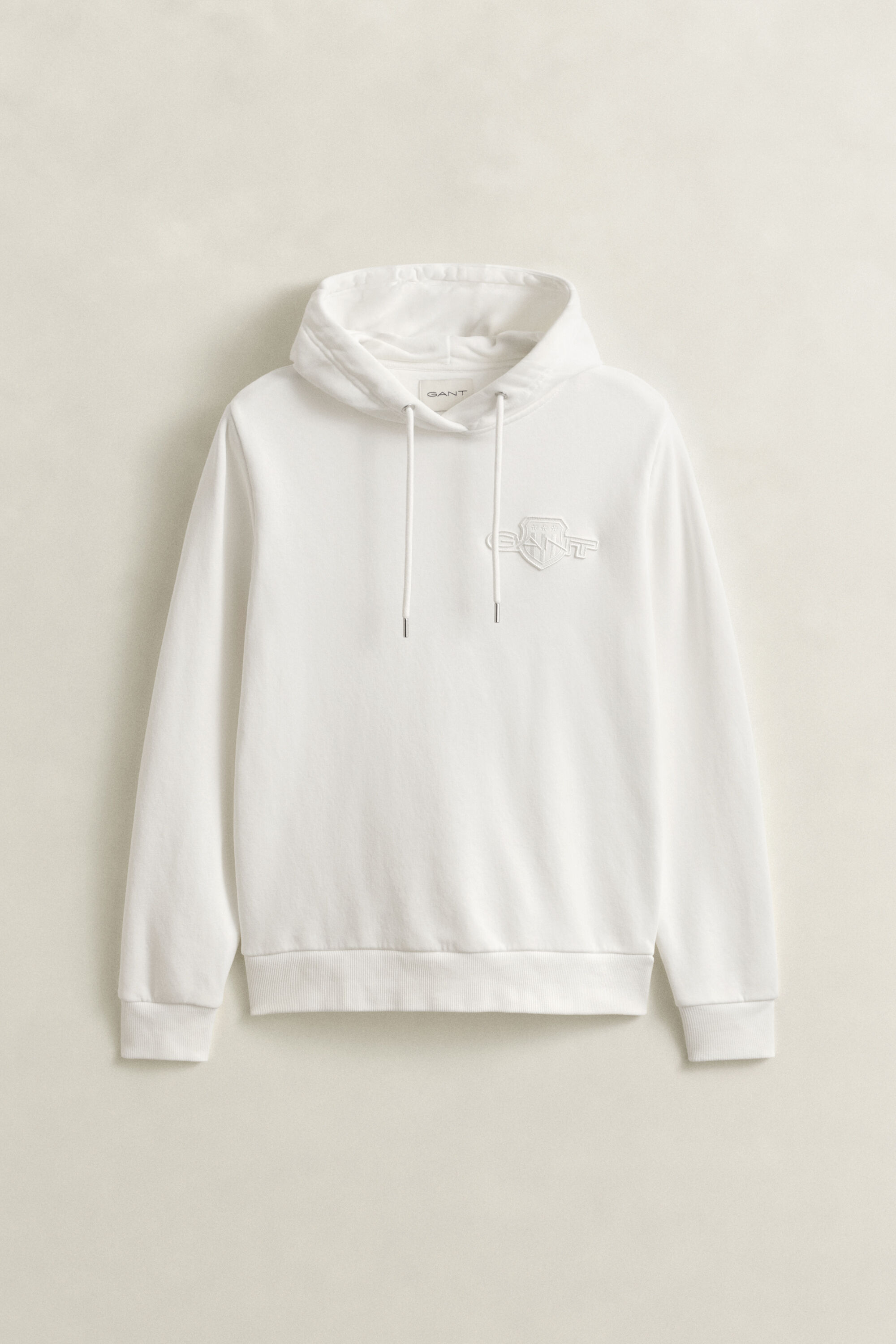 Sweat à capuche avec écusson ton sur ton