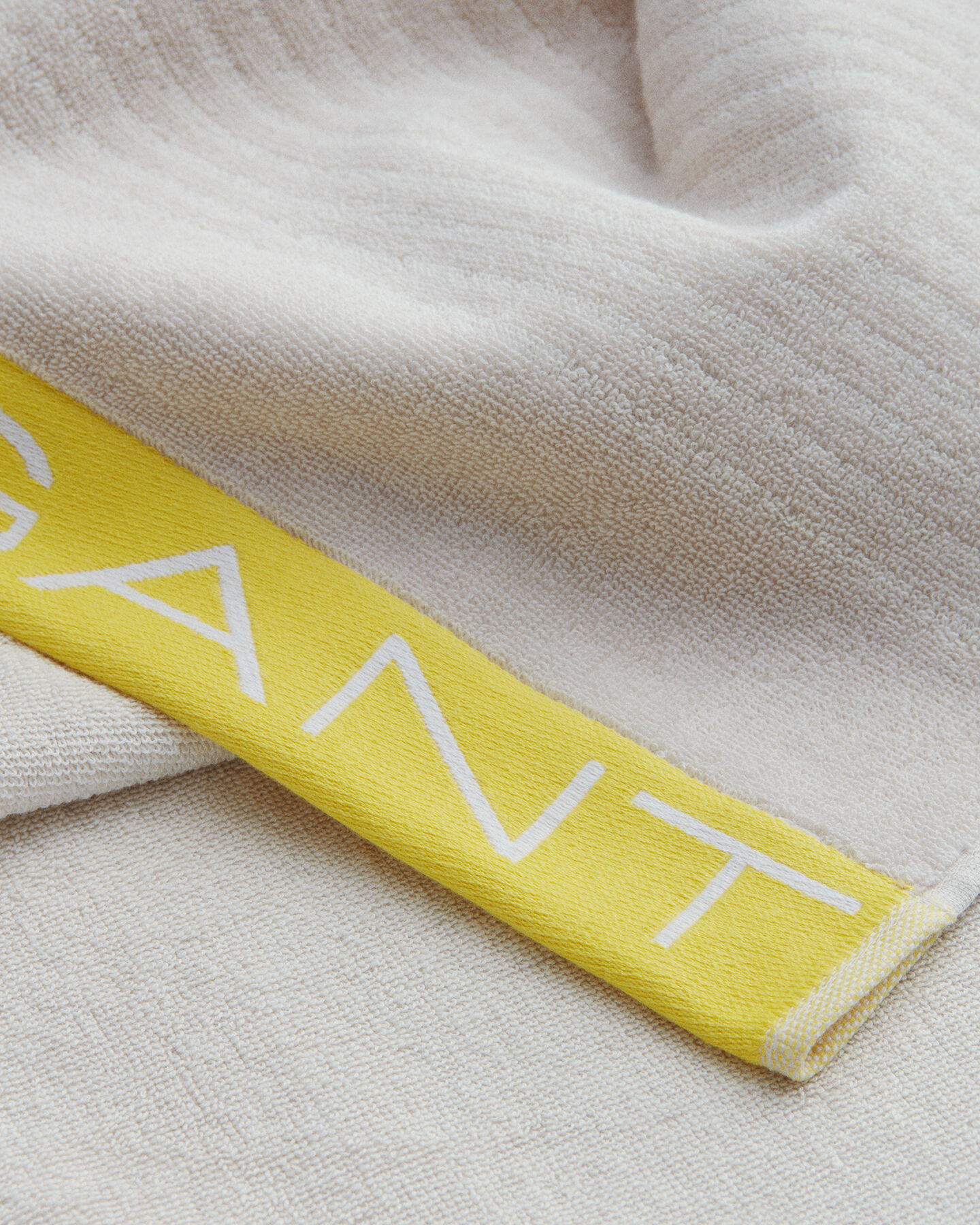 Strandlaken met ton sur ton streepje