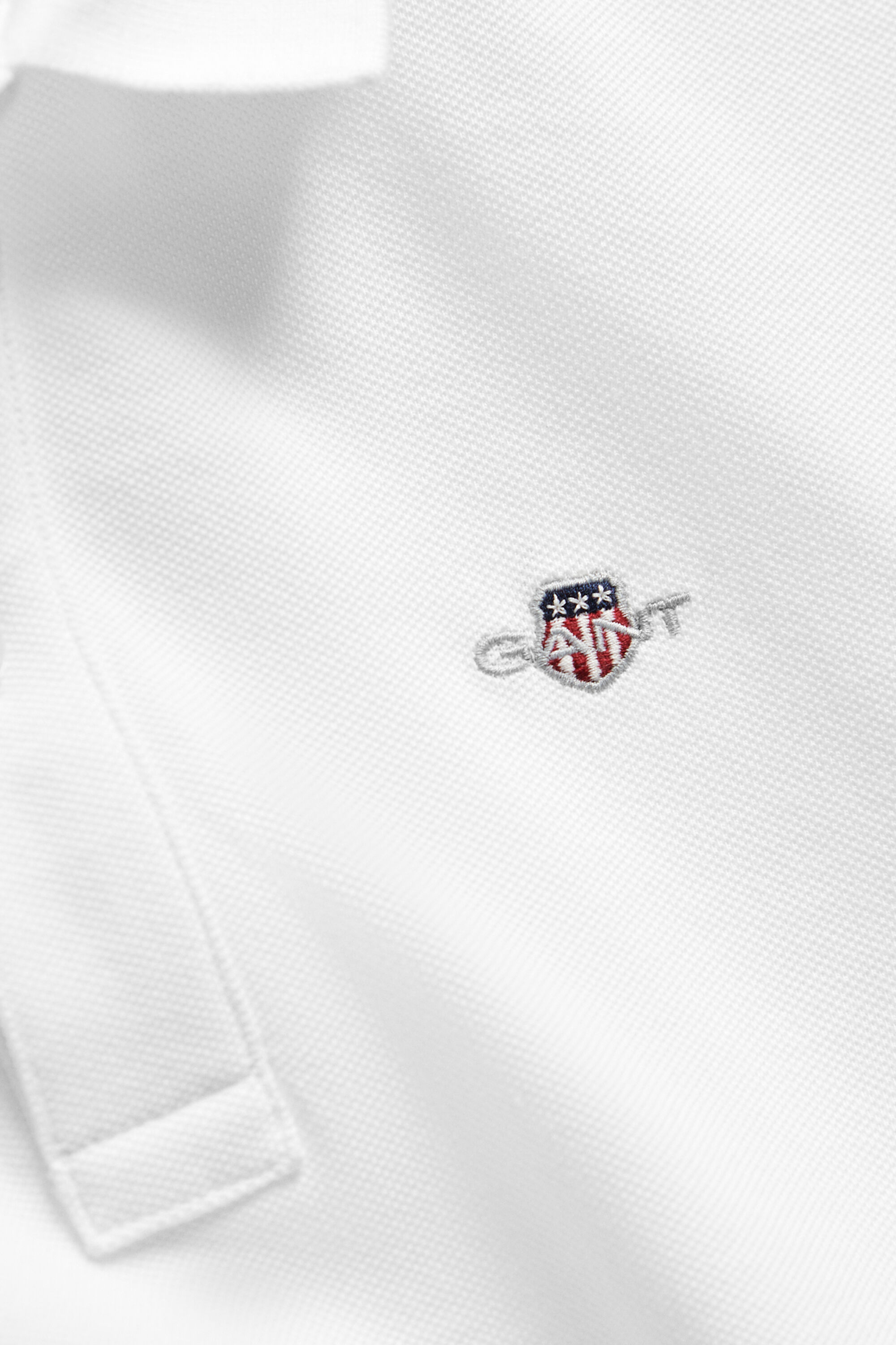 Poloshirt met schild voor tieners