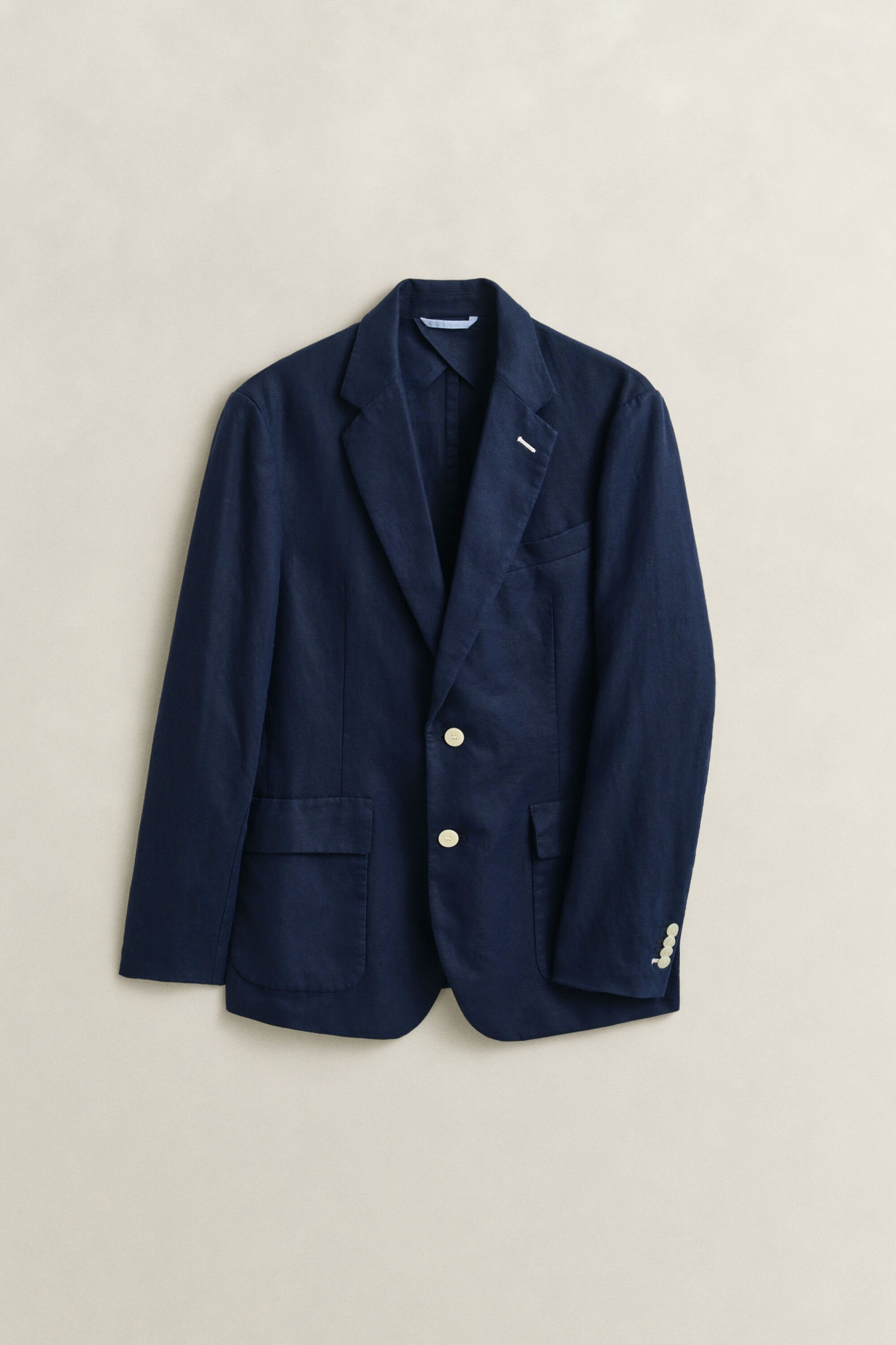 Kostuumjasje van een getextureerde katoenmix