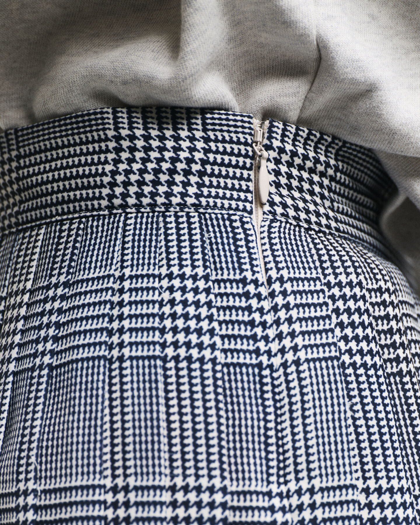 Plooirok met ruitjesprint