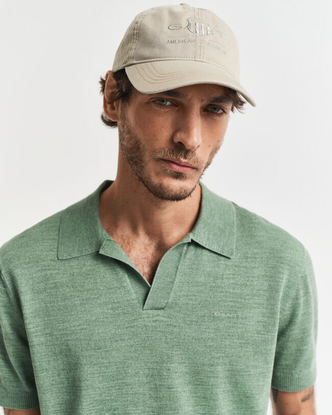 Sunfaded polotrui met korte mouwen