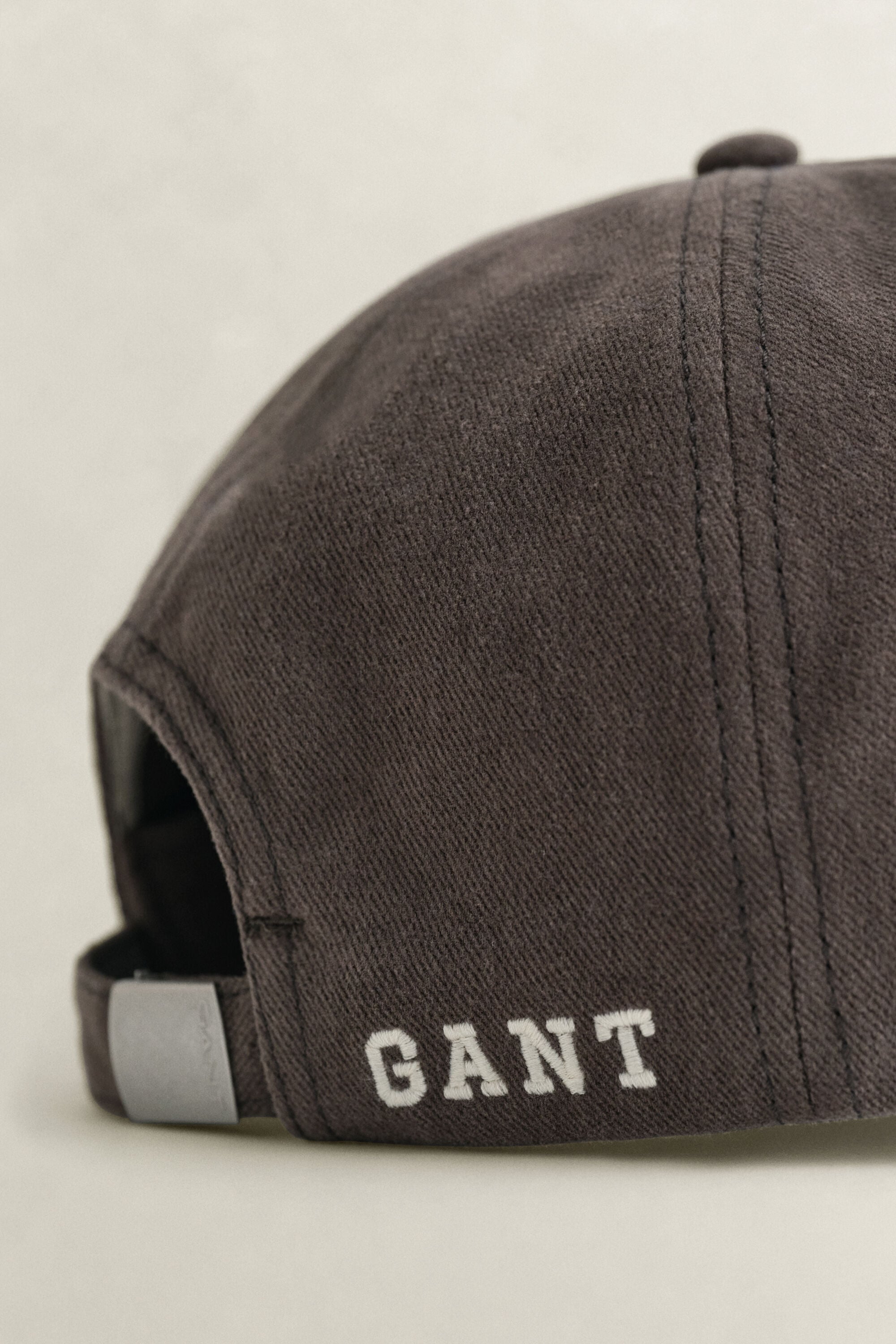 Moleskin pet met G-badge