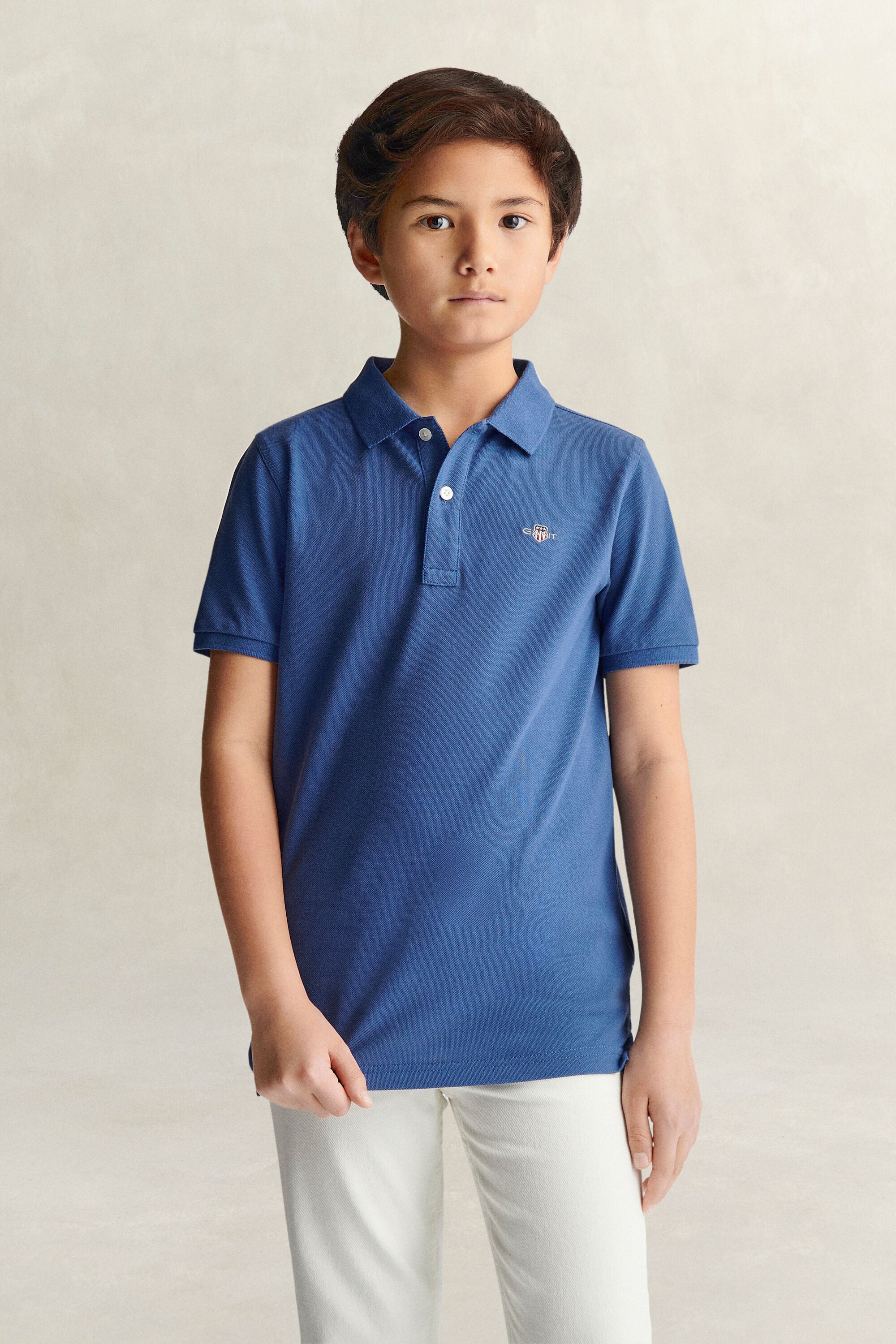 Poloshirt met schild voor tieners