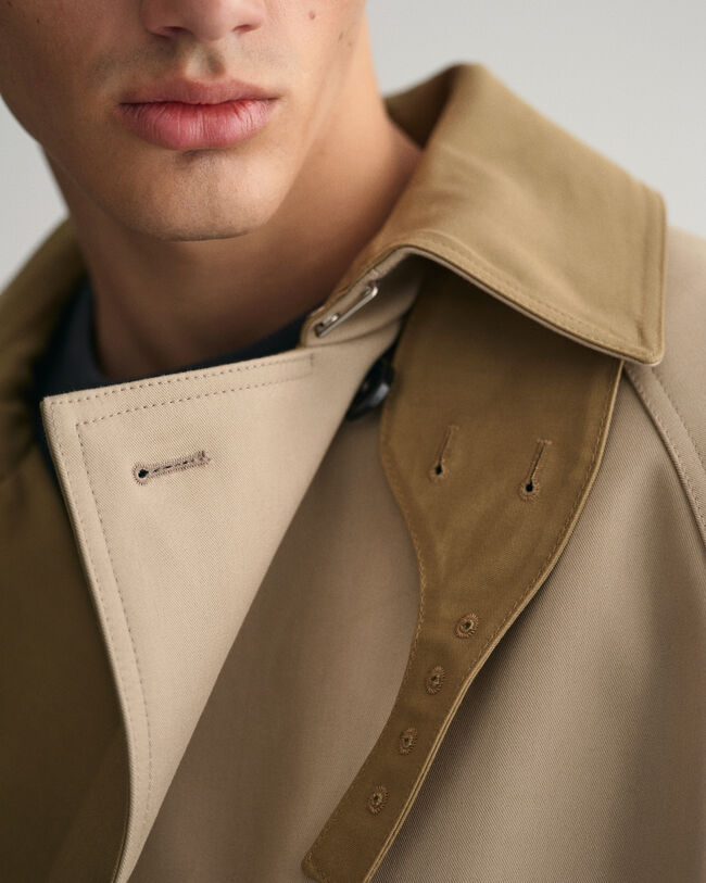 Trench-coat à coutures fixées