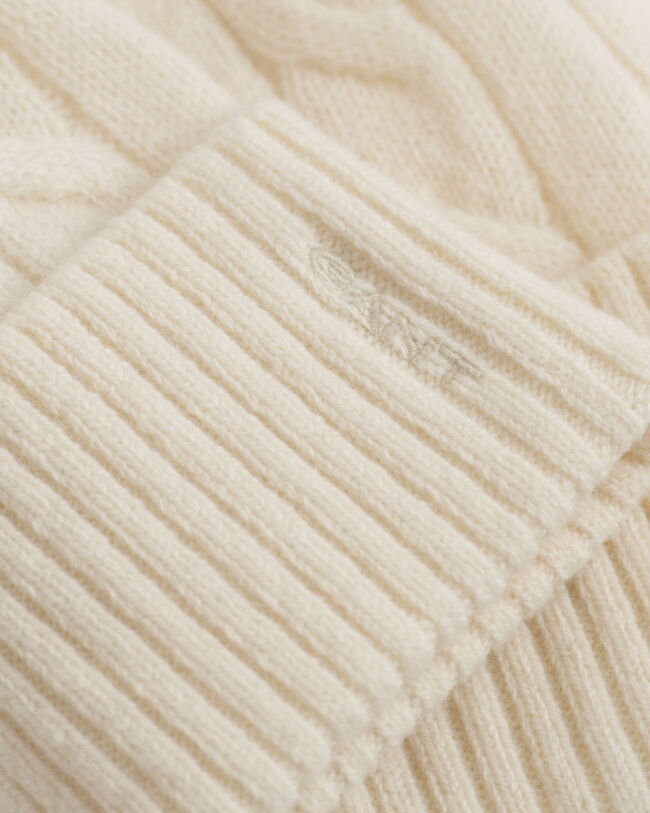 Bonnet en maille de laine à torsades