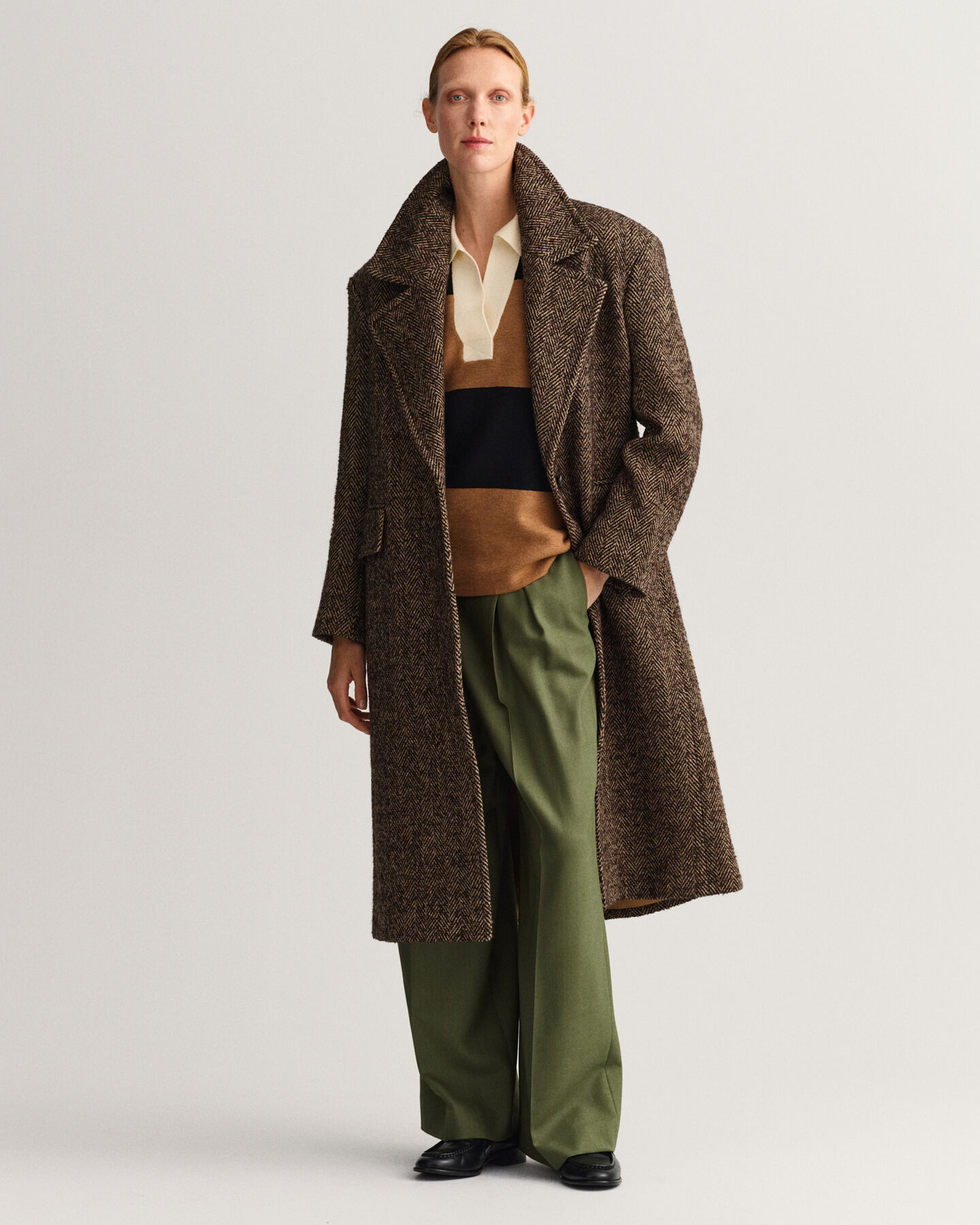 Overjas met visgraatmotief