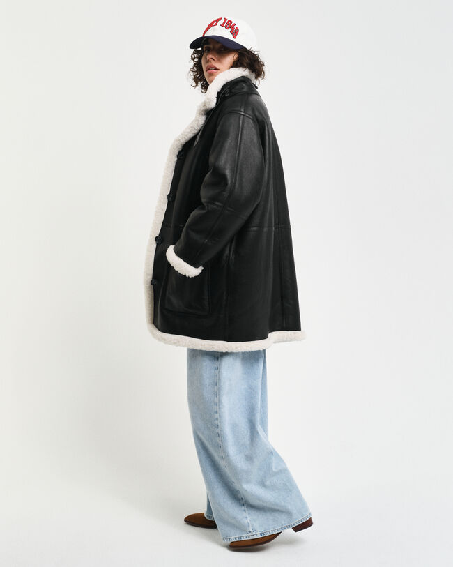 Manteau en peau lainée