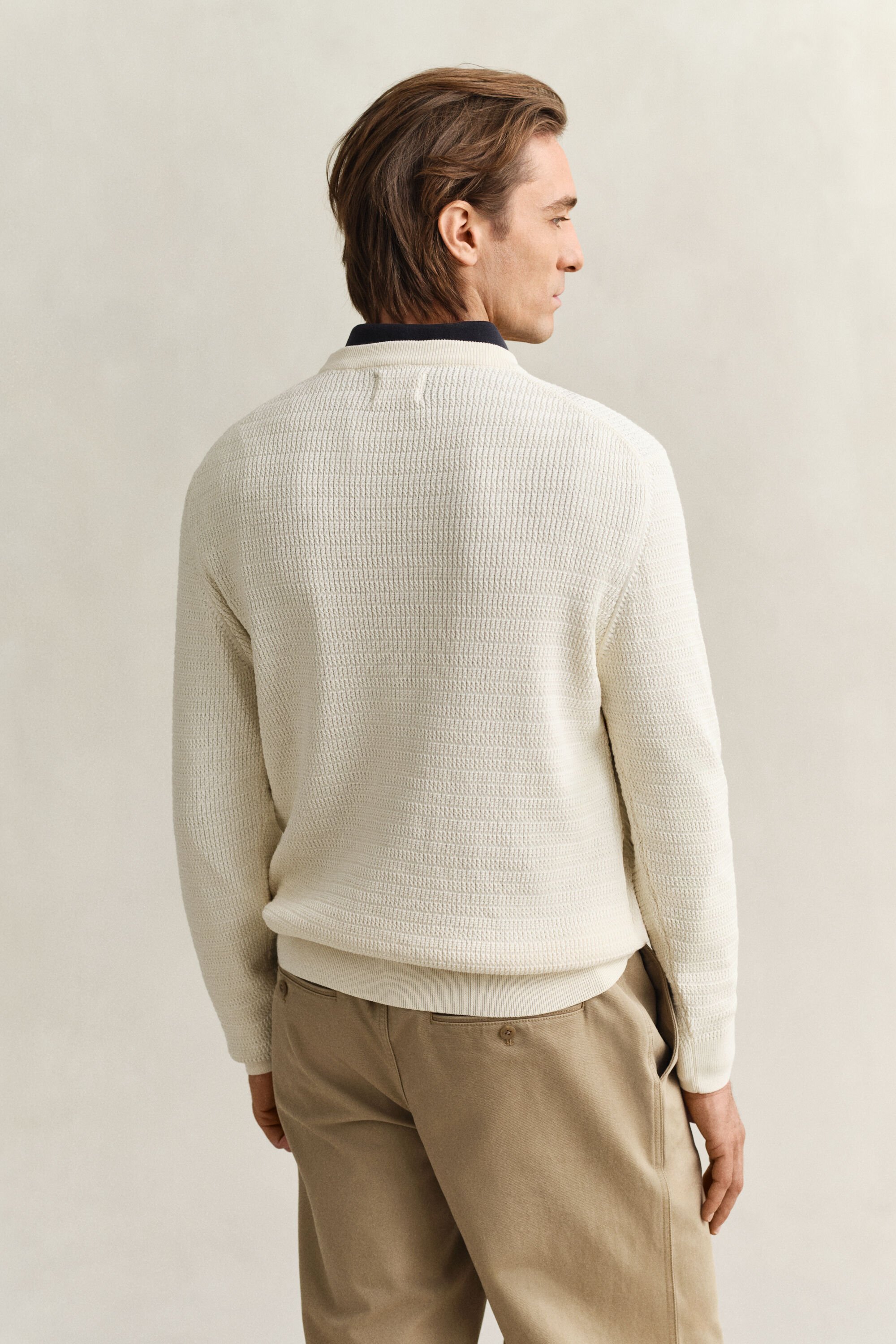 Gebreide trui met minikabels en ronde hals