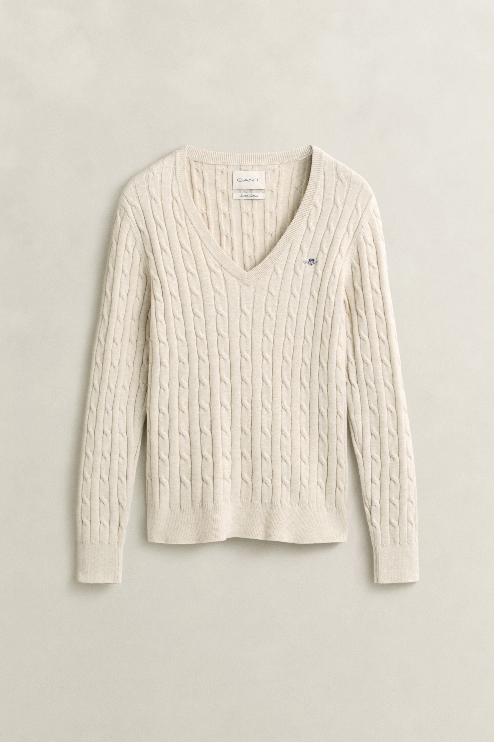 Pull col V en maille de coton stretch à torsades