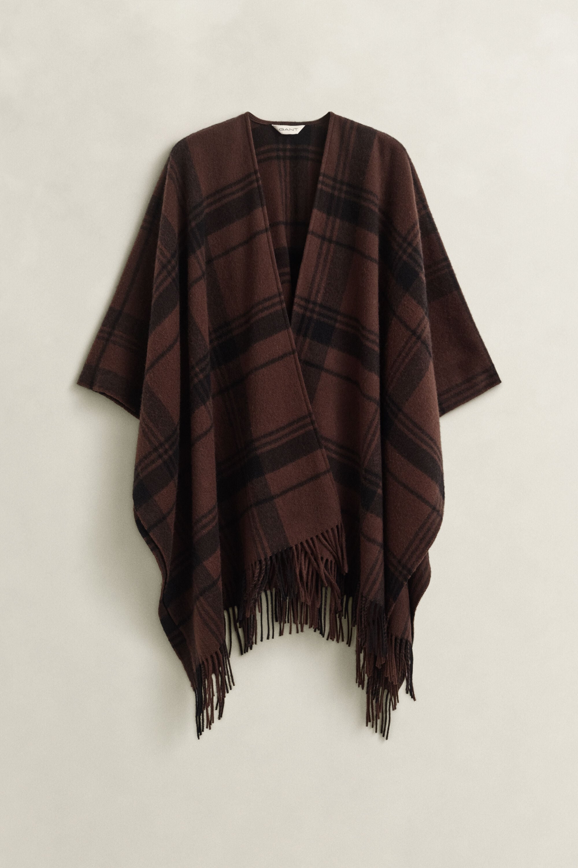 Geruite wollen poncho