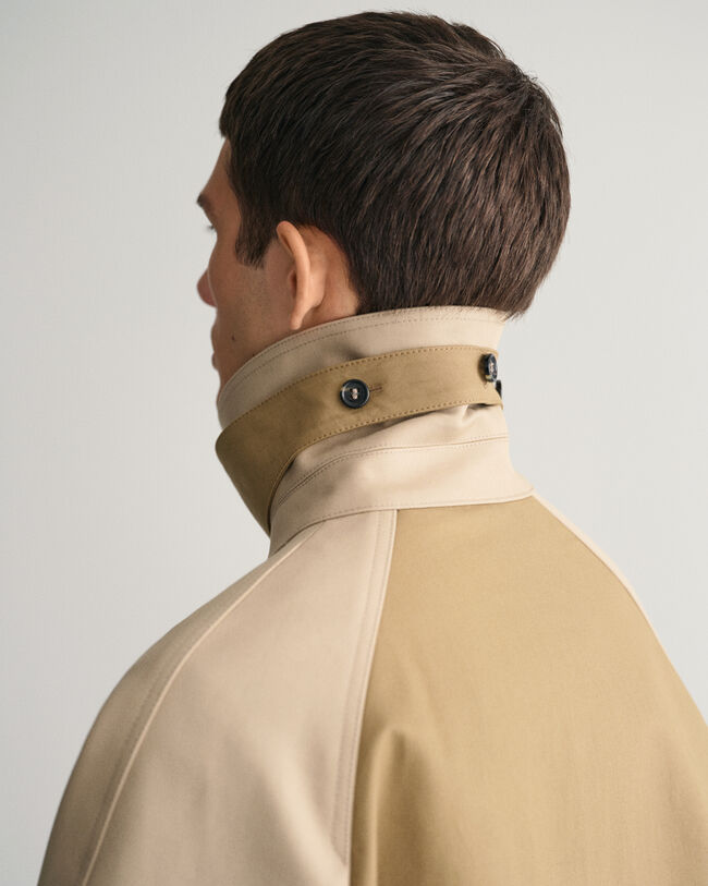 Trench-coat à coutures fixées