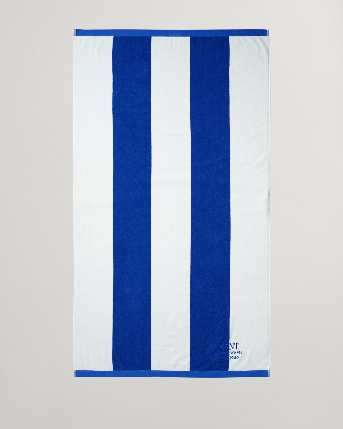 Serviette de plage à rayures éclatantes