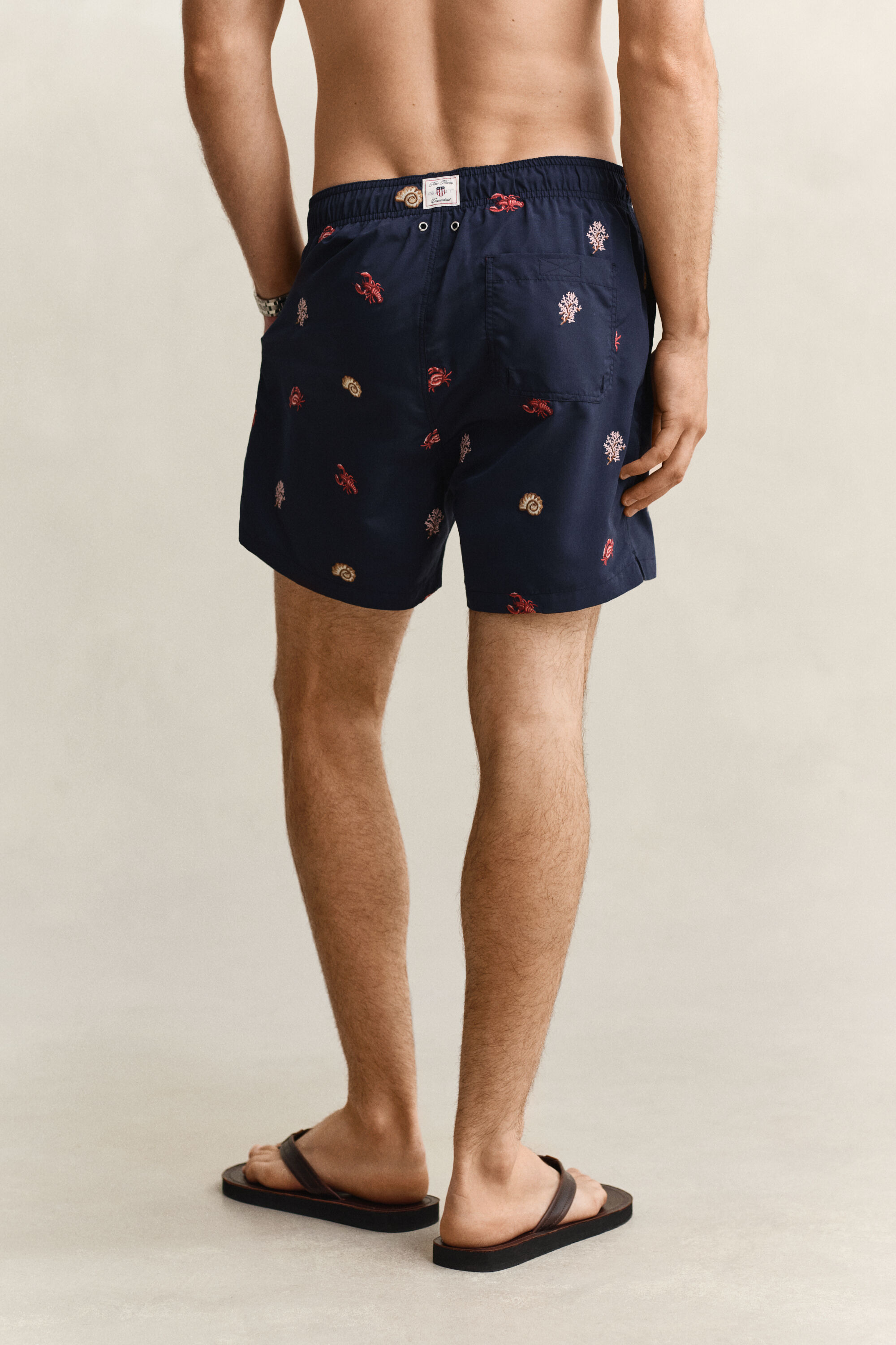 Short de bain à motif homard brodé