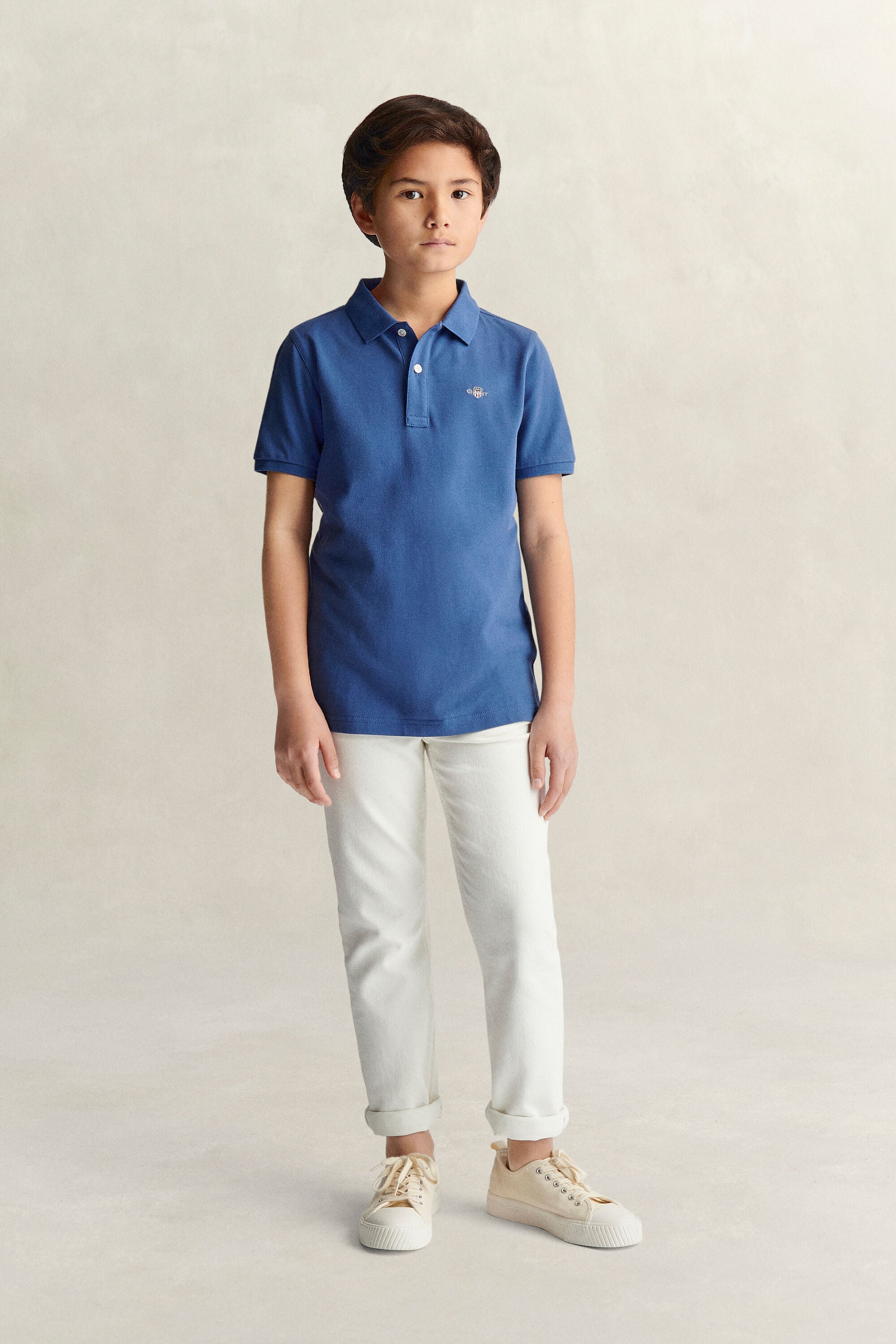 Poloshirt met schild voor tieners