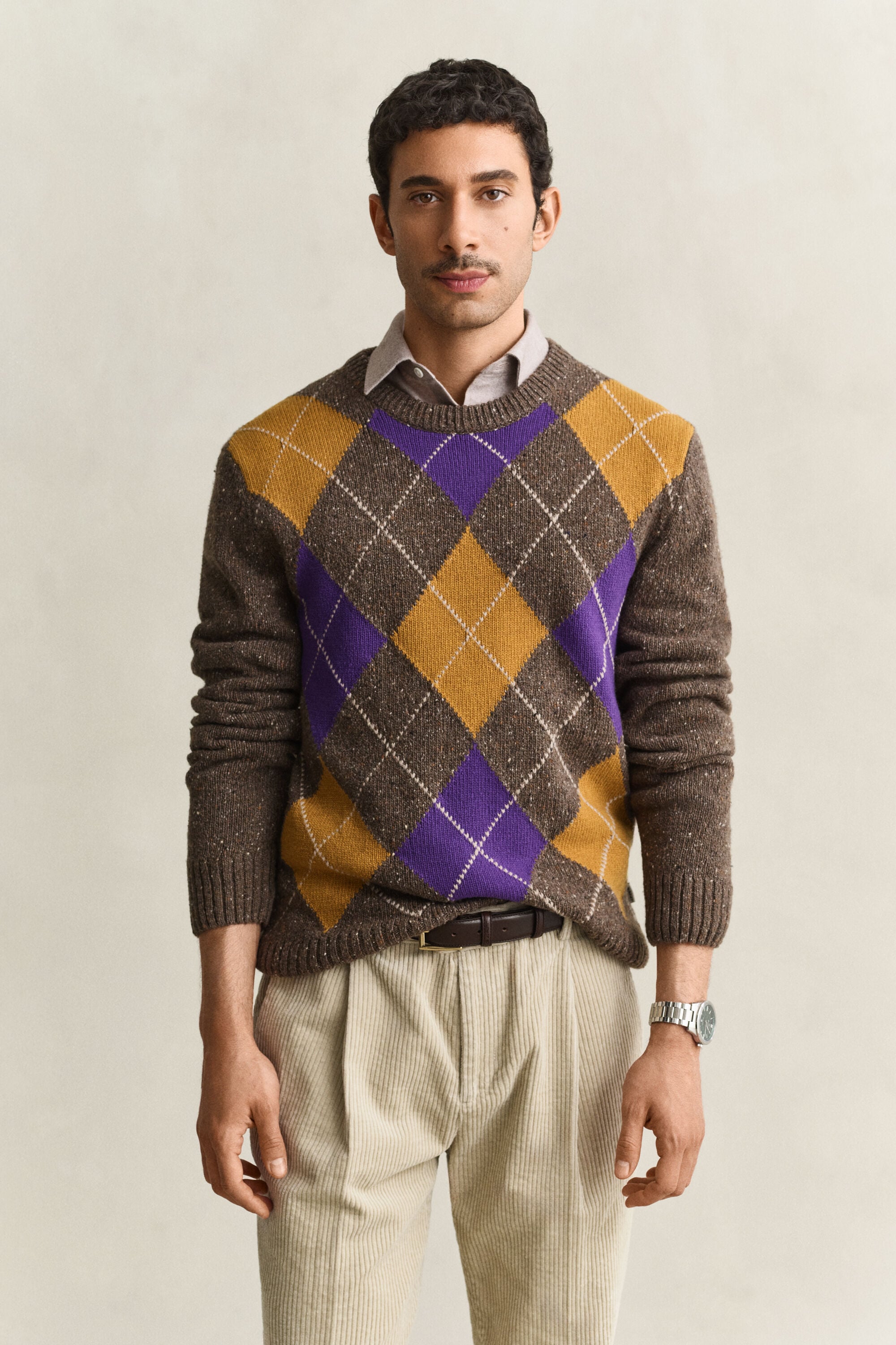 Pull col rond à motif argyle moucheté