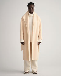 Manteau cousu main avec ceinture