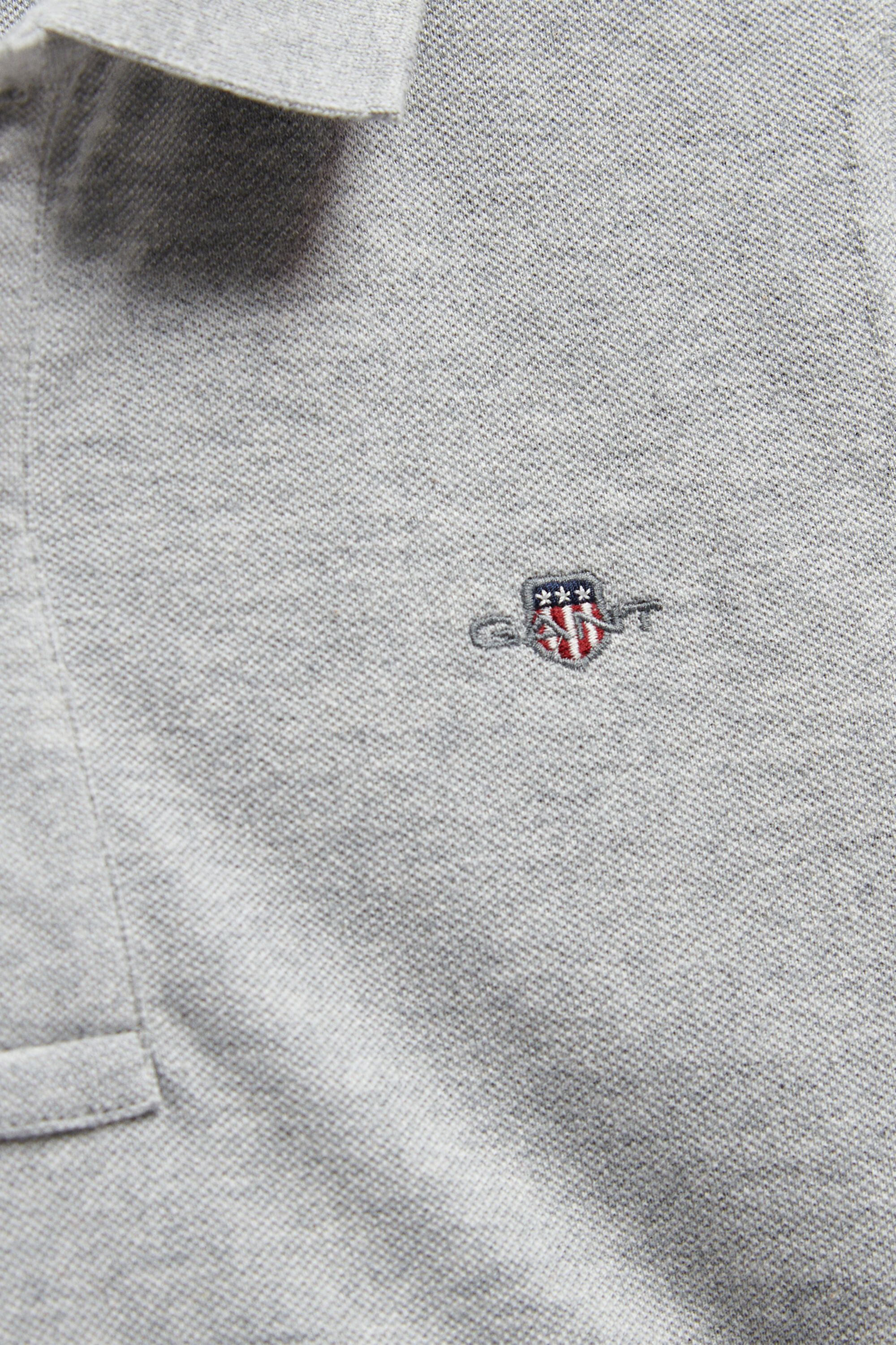 Poloshirt met schild voor tieners