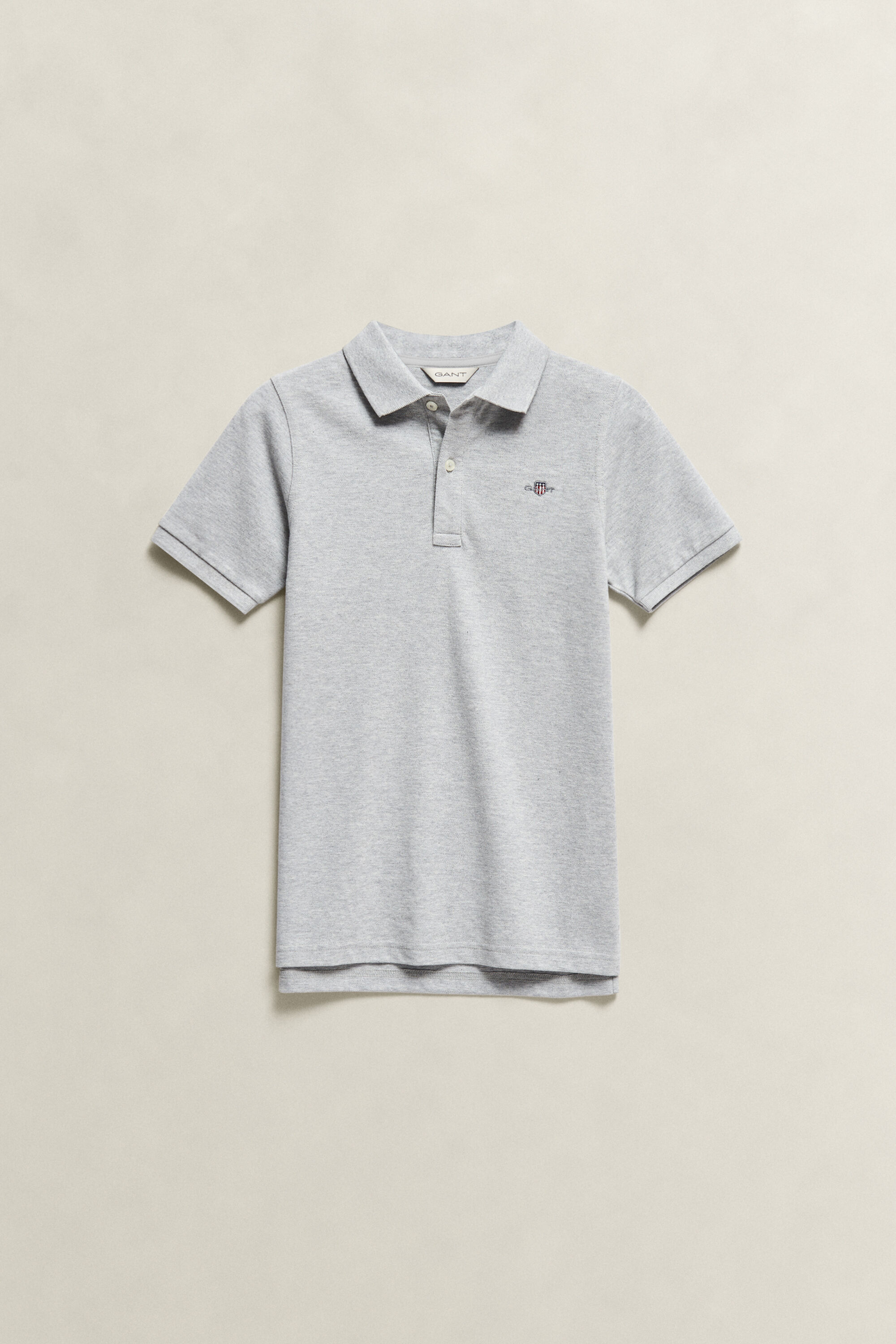 Poloshirt met schild voor tieners