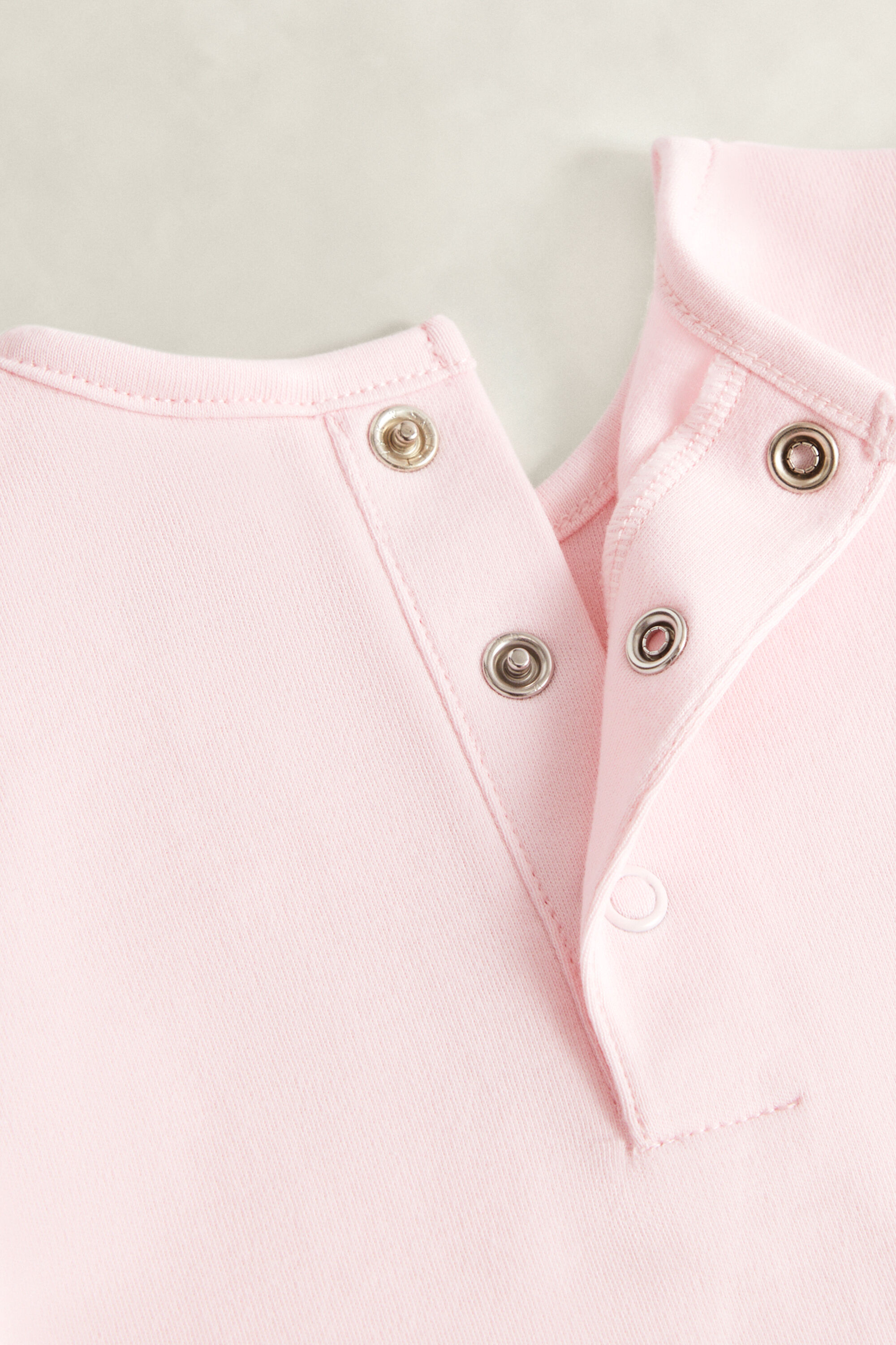 Barboteuse à fleurs pour bébé fille