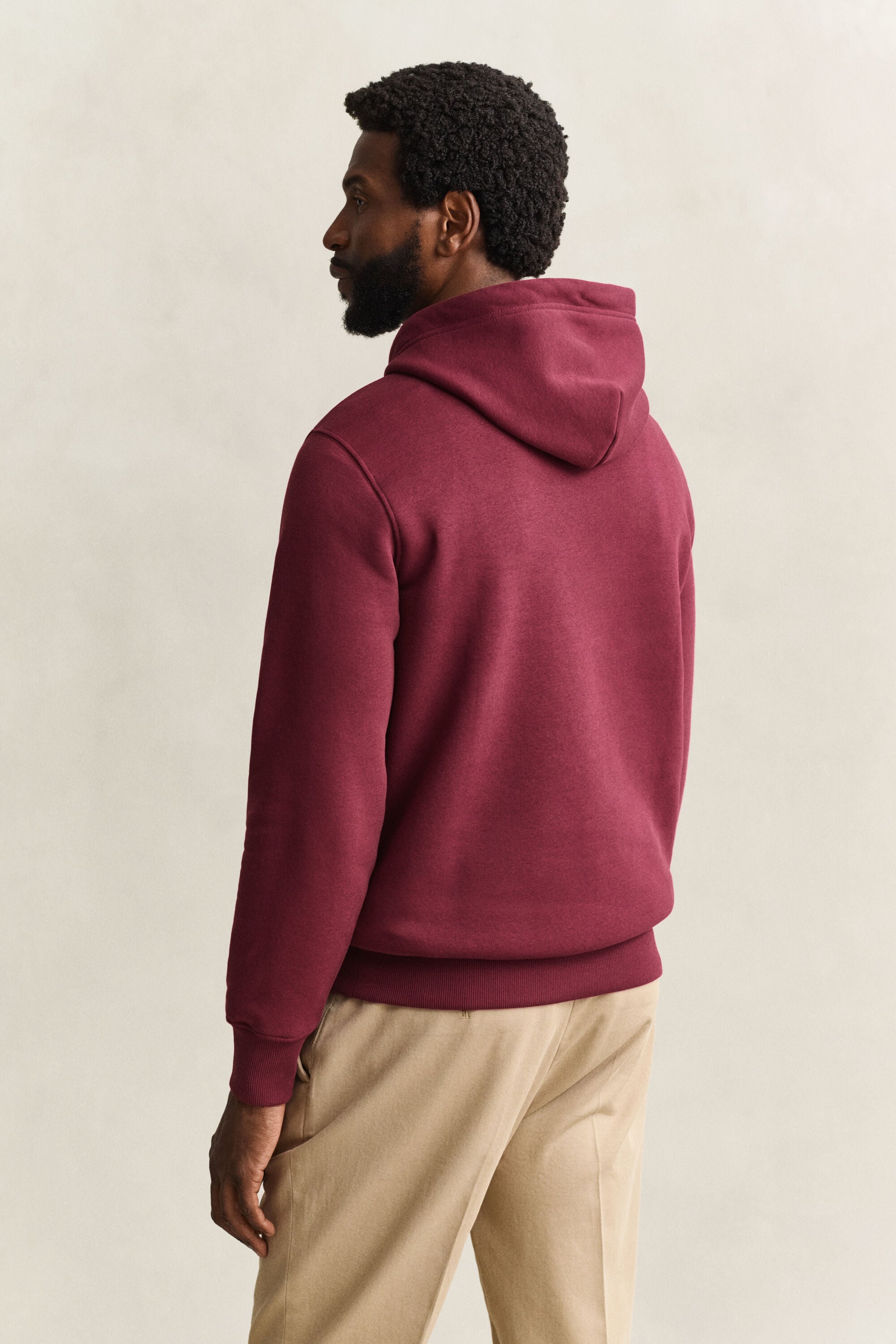 Sweat à capuche avec écusson