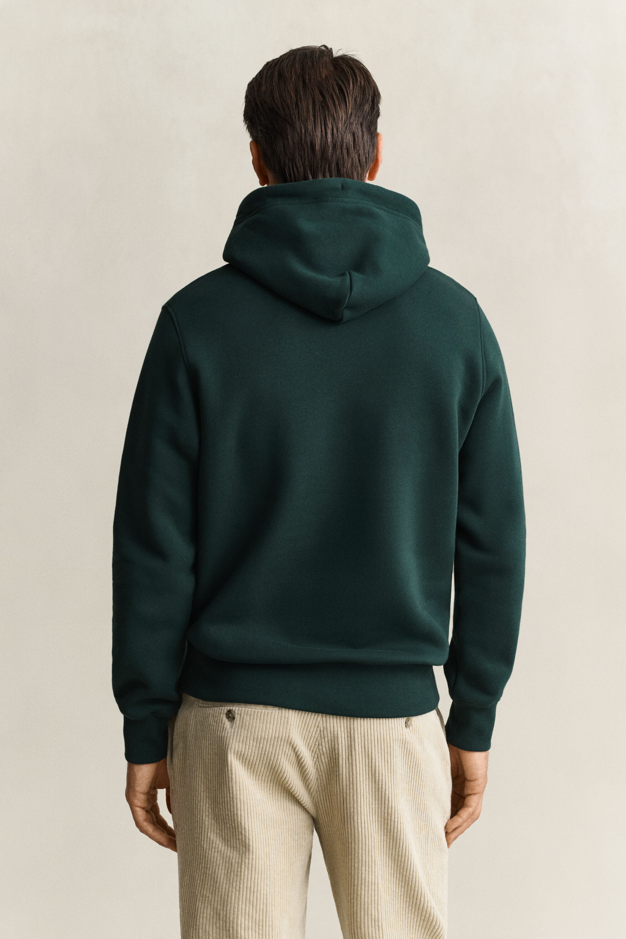 Sweat à capuche avec écusson